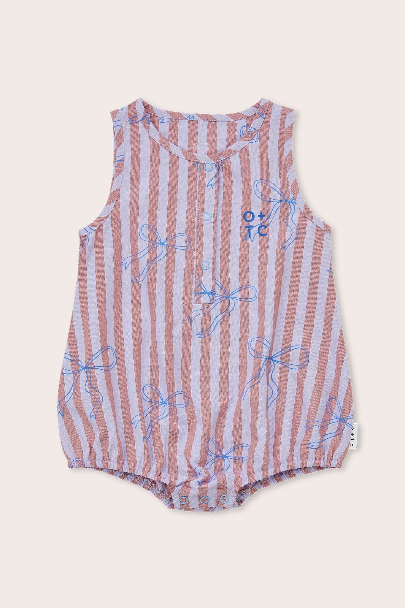 Introducing the Blue Bows Bubble Romper from OLIVE + THE CAPTAIN. This charming sleeveless baby onesie showcases a light pink and white vertical stripe pattern, adorned with adorable blue bow illustrations. A small blue icon featuring a face and letters decorates the chest area. For added convenience, it includes snap buttons at the bottom, making diaper changes quick and easy.