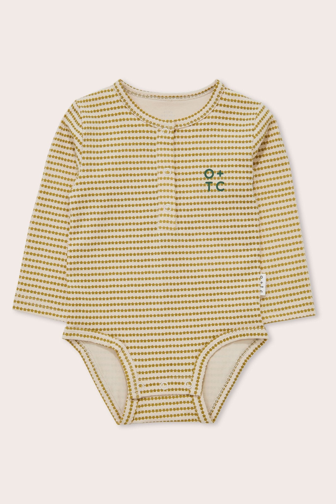 The Mini Stars Long Sleeve Bodysuit by OLIVE + THE CAPTAIN showcases a green and beige striped pattern. It features a small green embroidered logo on the left chest and three snap buttons. Made from soft and comfortable cotton terry fabric, this bodysuit is perfect for infants.