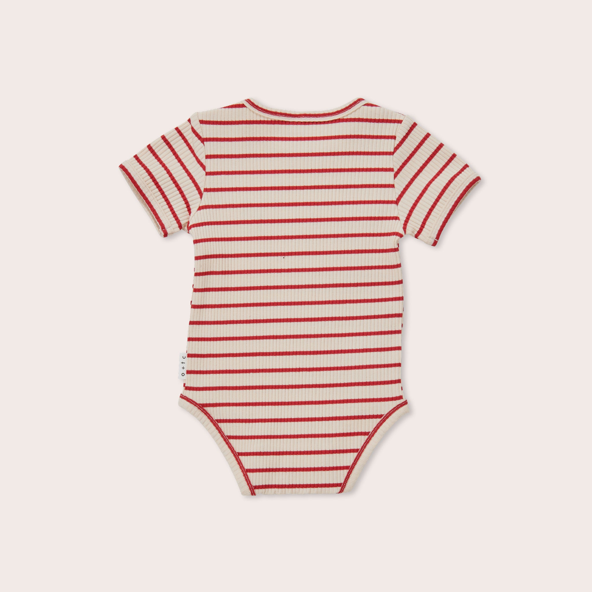 The Samba Stripe Bodysuit by OLIVE + THE CAPTAIN is a short-sleeved baby onesie featuring red and white horizontal stripes. Crafted from premium cotton, it offers a round neckline and snap closures at the bottom for convenient diaper changes. The soft, ribbed fabric ensures comfort, and the image showcases the back side of this delightful garment.