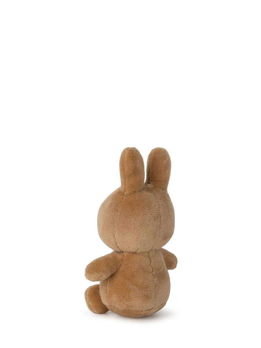 The Lucky Miffy in Giftbox Beige 10cm, a product from BON TON TOYS X MIFFY, is pictured from the back against a plain white background. This charming plush toy, handcrafted with simple rounded features and two upright ears, adds a touch of luck to any setting.