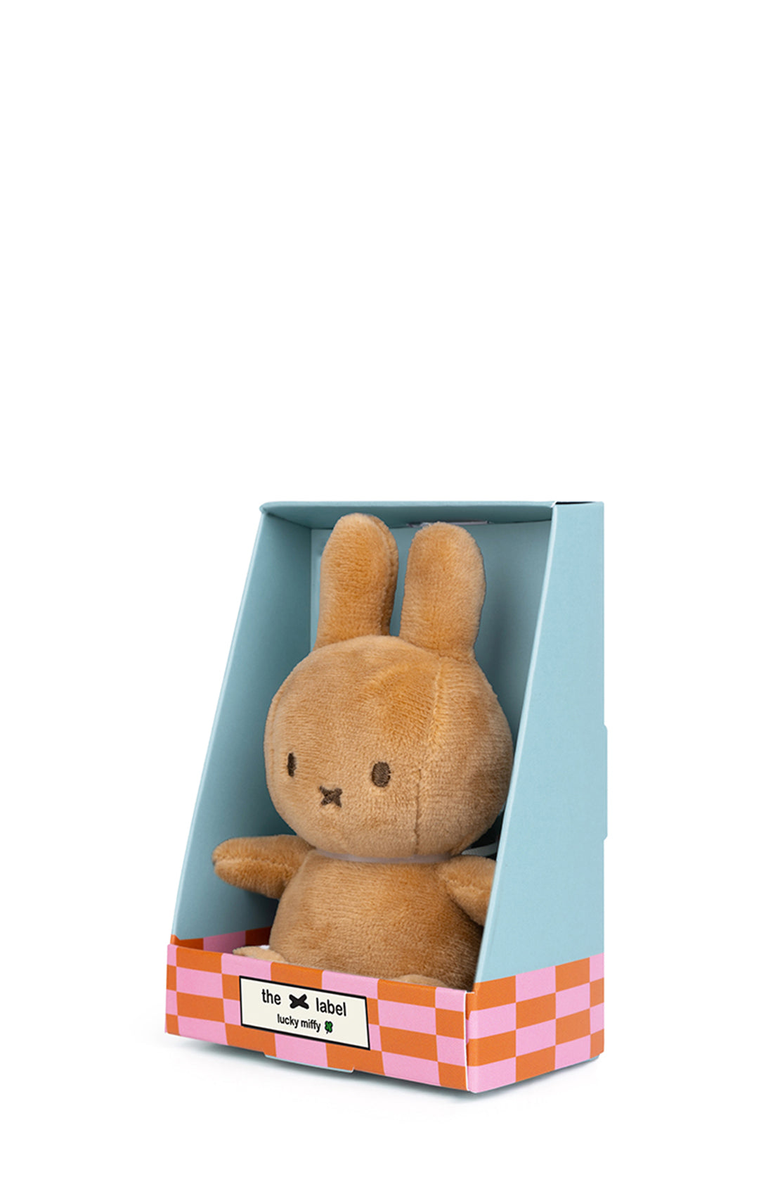 A small beige plush bunny from BON TON TOYS X MIFFY, made from recycled polyester, is nestled inside a blue-green display box with a pink and orange checkered base. The box is labeled "Lucky Miffy in Giftbox Beige 10cm.