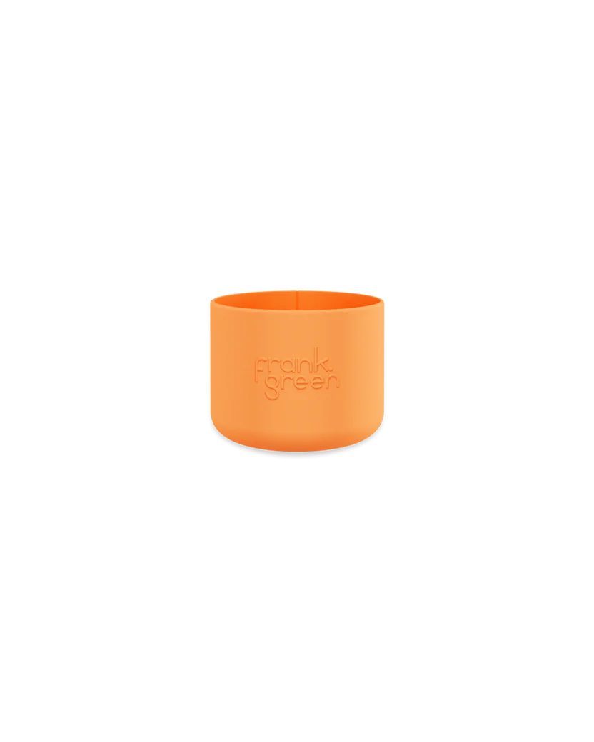 A neon orange Bottle Bumper Guard by FRANK GREEN is set against a black background, echoing the sleek appeal of Ceramic Reusable Bottles.