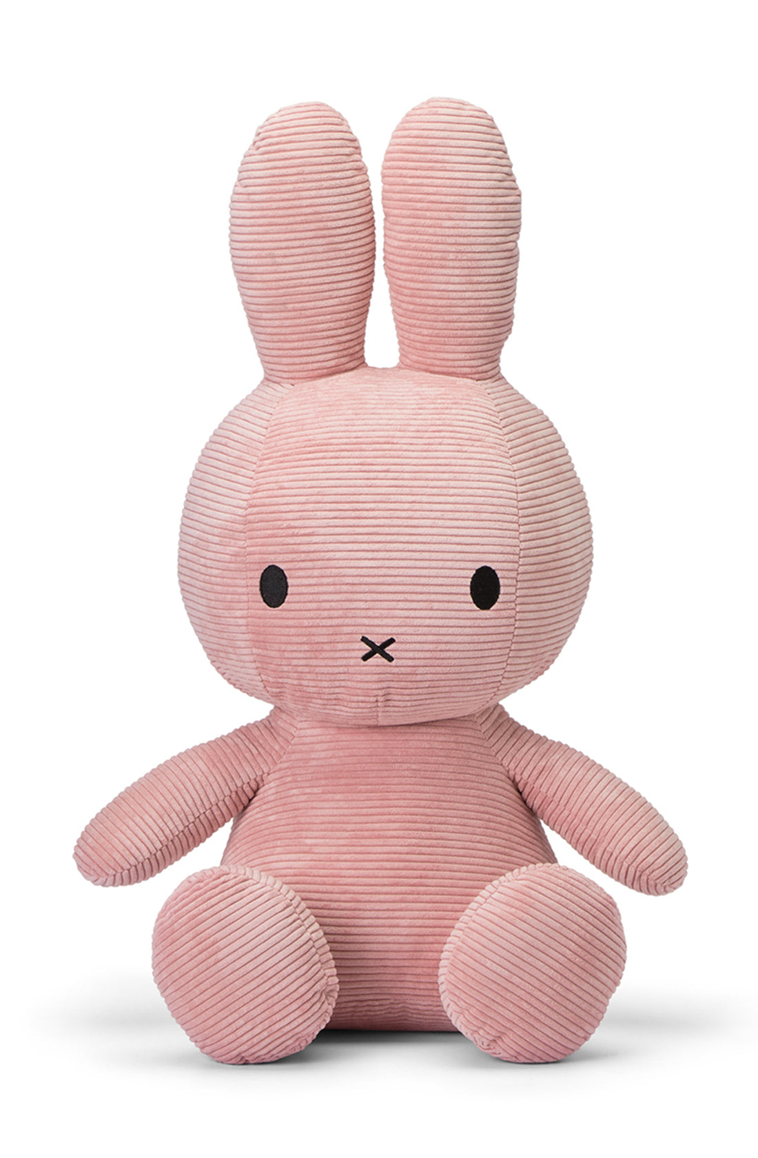 The Miffy Sitting Corduroy Pink 70 cm by BON TON TOYS X MIFFY is a delightful stuffed bunny featuring a soft, pink corduroy fabric. With its legs spread apart, the bunny showcases long ears, round black eyes, and a small X-shaped nose and mouth. The ribbed texture of the fabric adds to its cozy and tactile appeal, making this plush gift perfect for snuggles.