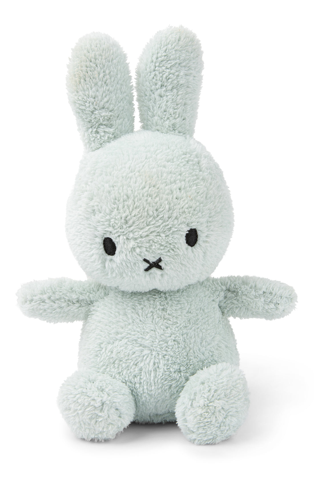 A small, cuddly plush toy bunny from the BON TON TOYS X MIFFY collection, named "Miffy Sitting Terry Soft Green 23 cm," features a light green color, long ears, black eyes, and a small "X" for a mouth. This adorable bunny is sitting upright against a white background and makes an excellent baby gift.