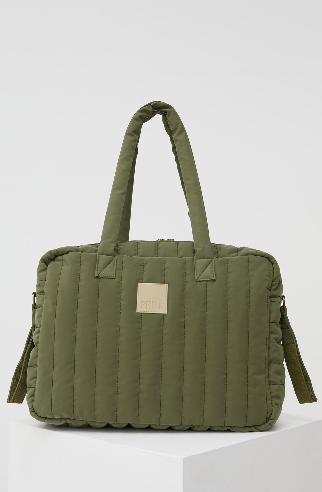 PHILÉ baby bag in khaki from the back.