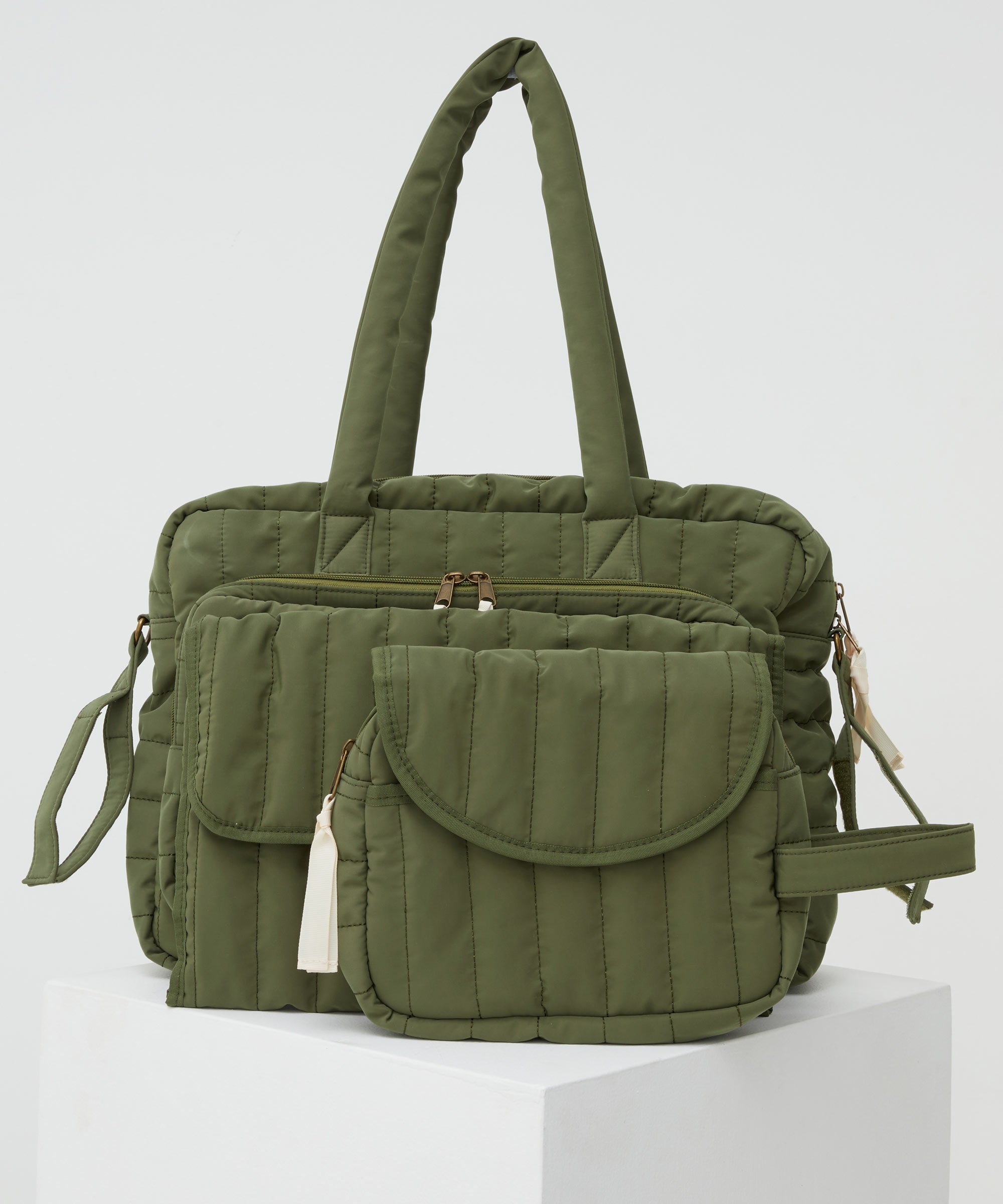 PHILÉ baby bag in khaki in large, medium and small.