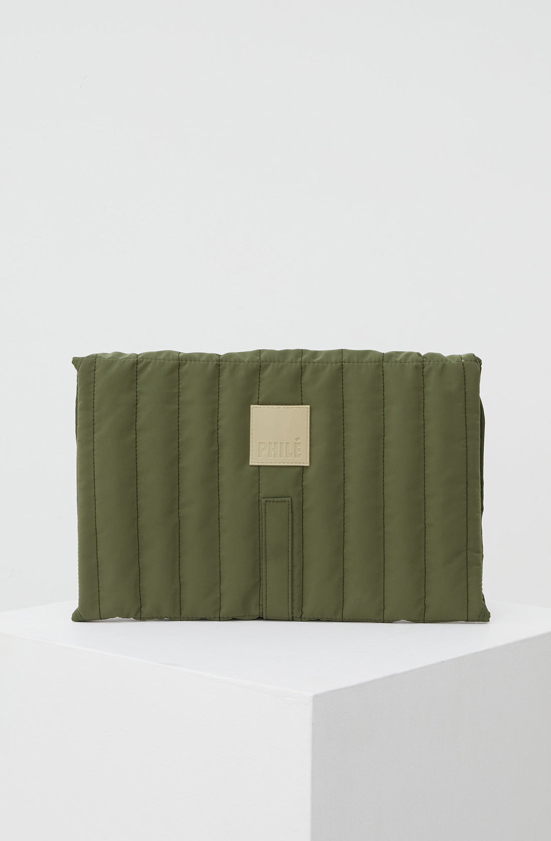 The back of the PHILÉ baby travel change mat in khaki.