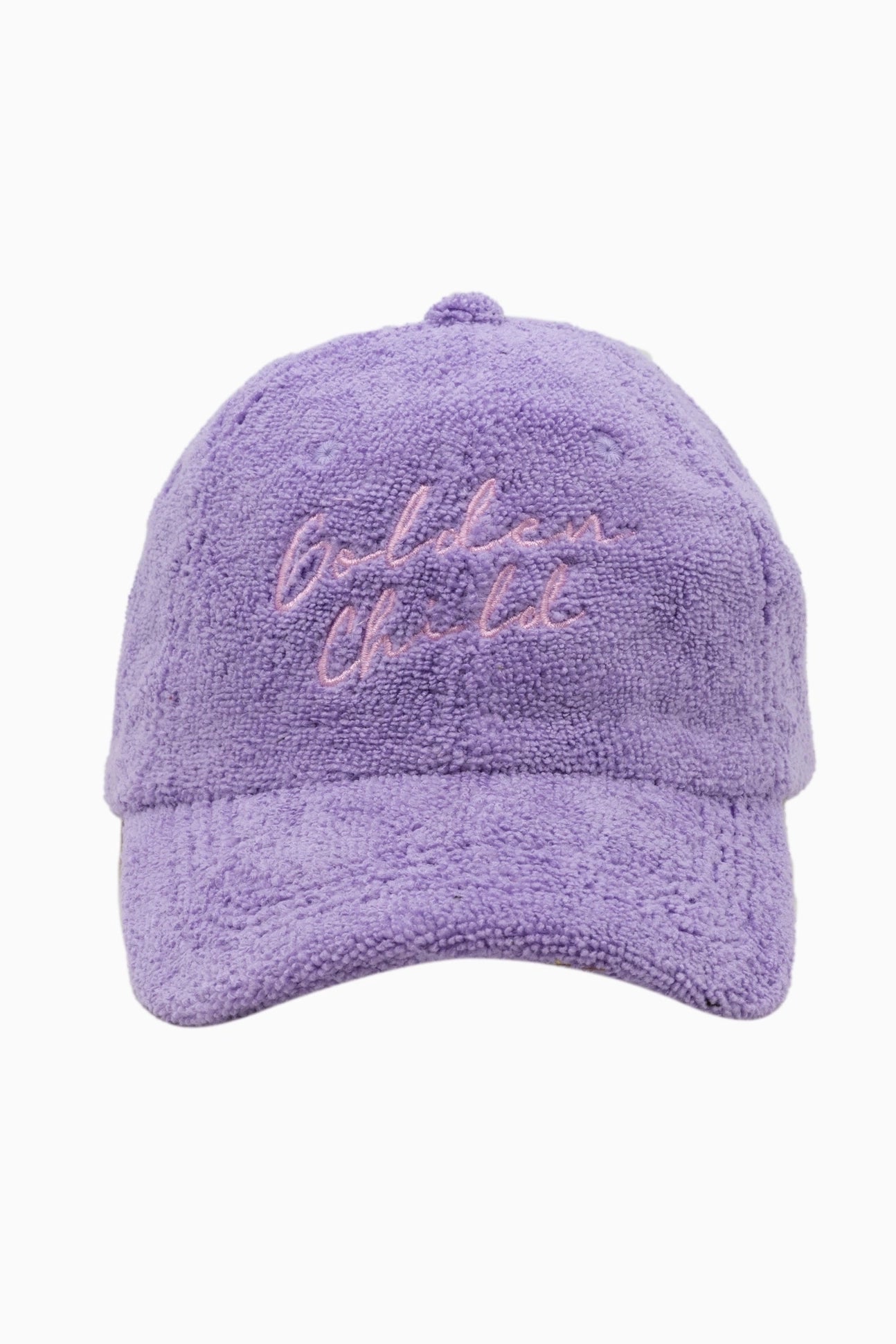 The Children's Terry Towelling Cap Grape by GOLDEN CHILD is a purple textured baseball cap made from terry towelling fabric. It features "Golden Child" embroidered in pastel pink on the front, designed specifically for children, and includes an adjustable velcro back for a comfortable fit.