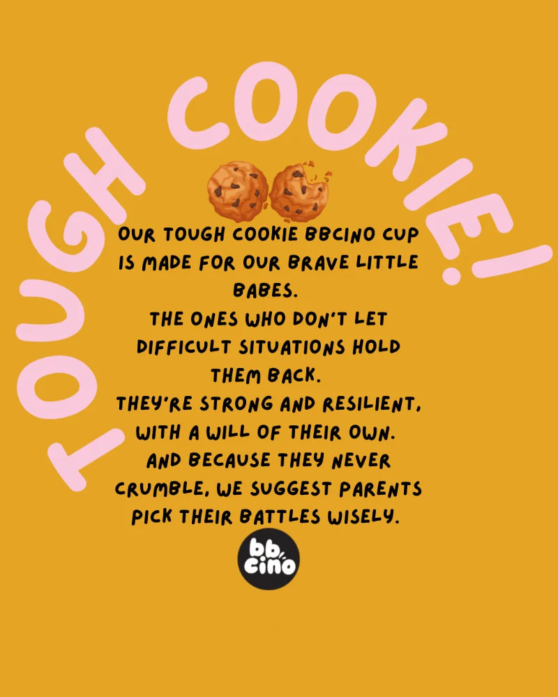 On a circular orange background, the pink text shouts "TOUGH COOKIE!" Below, you'll find a description of BBCINO's Reusable Babycino Cup 120ml Tough Cookie in Blue—crafted for our brave little babes. Complete with cookie graphics and paired perfectly with a reusable silicone straw for eco-friendly sips!