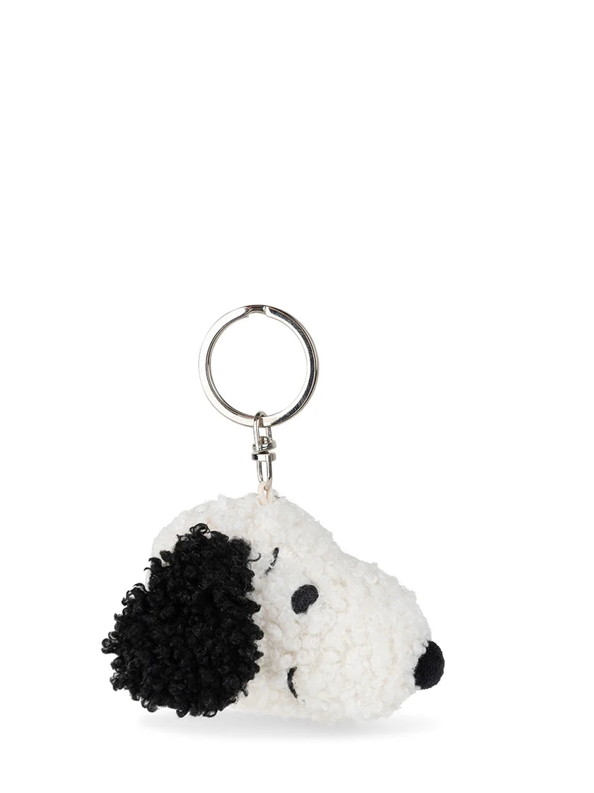 The Bon Ton Toys - Snoopy ECO Tiny Teddy Cream Keychain 4.5cm by BON TON TOYS X MIFFY features a plush Snoopy head with white fur and black ears, crafted from recycled polyester and attached to a silver keyring.