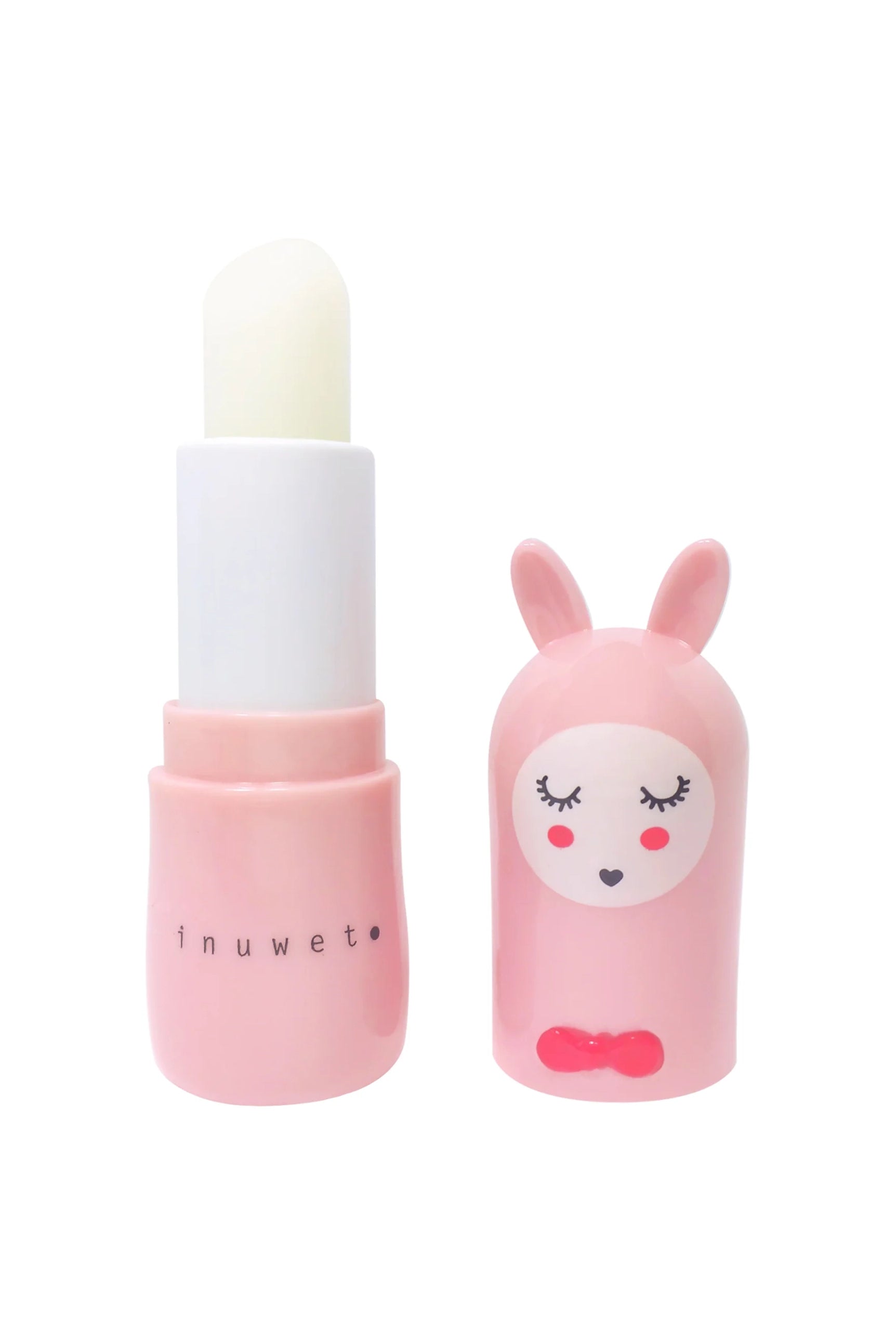 A lip balm with a whimsical strawberry scent and a charming design that includes a cute face on the cap, featuring closed eyes, blushing cheeks, and rabbit ears. The tube is printed with the brand name "INUWET". This vegan formula balm is white and cylinder-shaped.