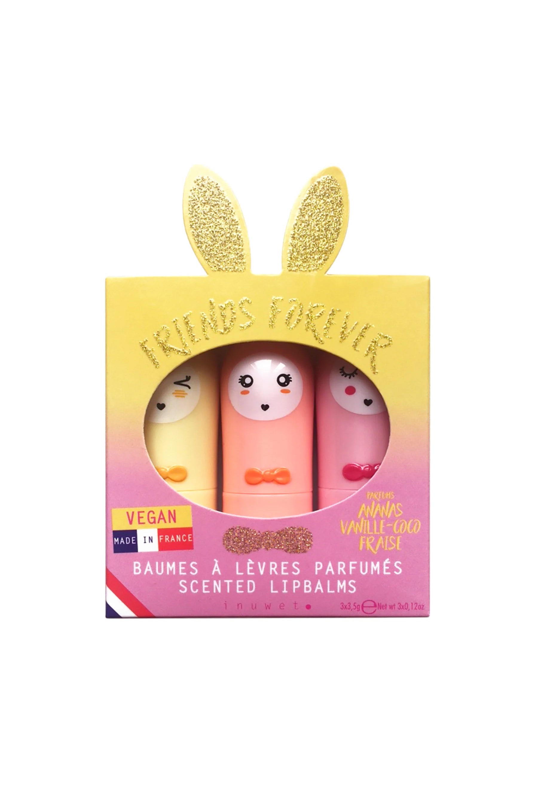 The Lip Balm Trio California by INUWET comes in a vibrant packaging adorned with gold glittery text that reads "Friends Forever" and features a pair of gold glitter bunny ears. Inside, you'll find three cruelty-free lip balms, each with adorable, kawaii-style faces. These vegan lip balms are made in France.