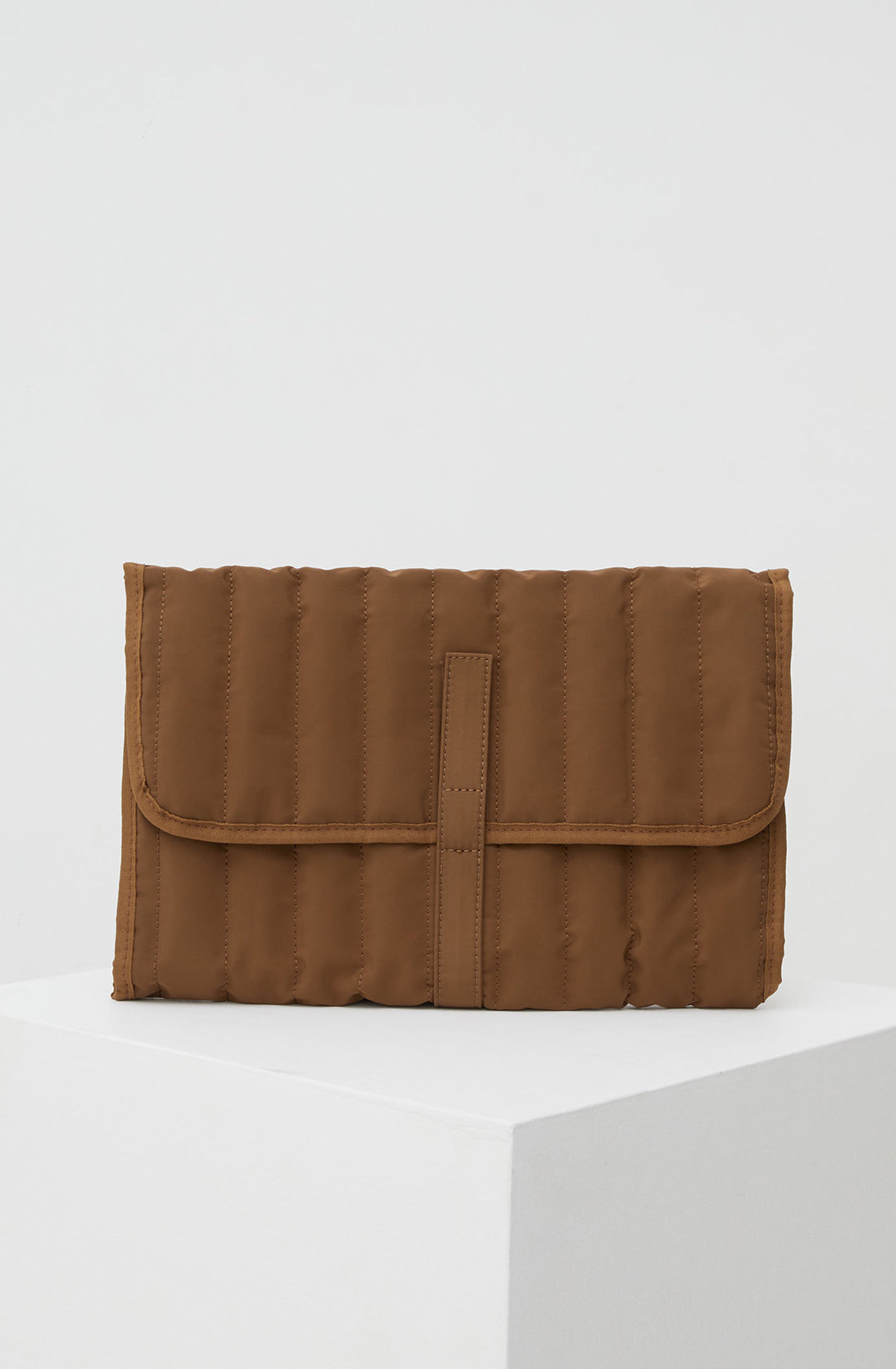 PHILÉ travel changing mat in brown.