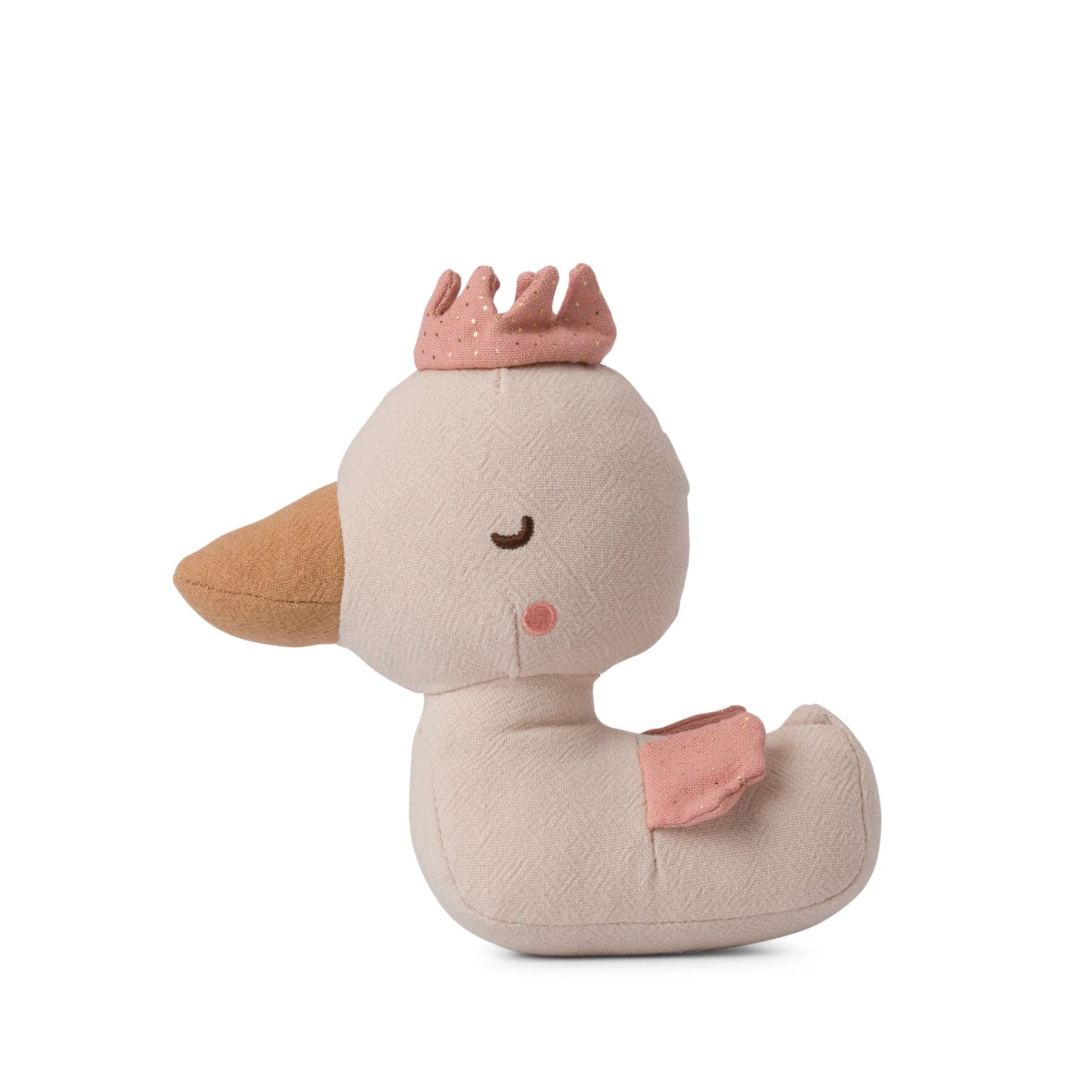 Duck Davey 17cm by PICCA LOULOU is a soft, beige toy duck with one closed eye, light pink cheeks, and a small smile. Adorned with a pink fabric crown and featuring one pink wing, this charming stuffed animal sits in a delightful side-facing position, making it the perfect nursery decoration.