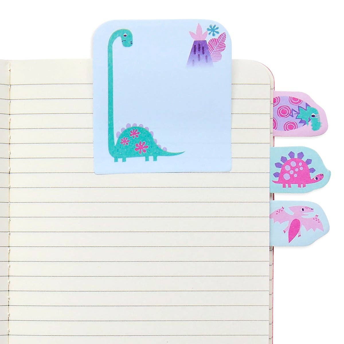 A dino sticky note pad inside a lined workbook with three others poking out the side of the book.