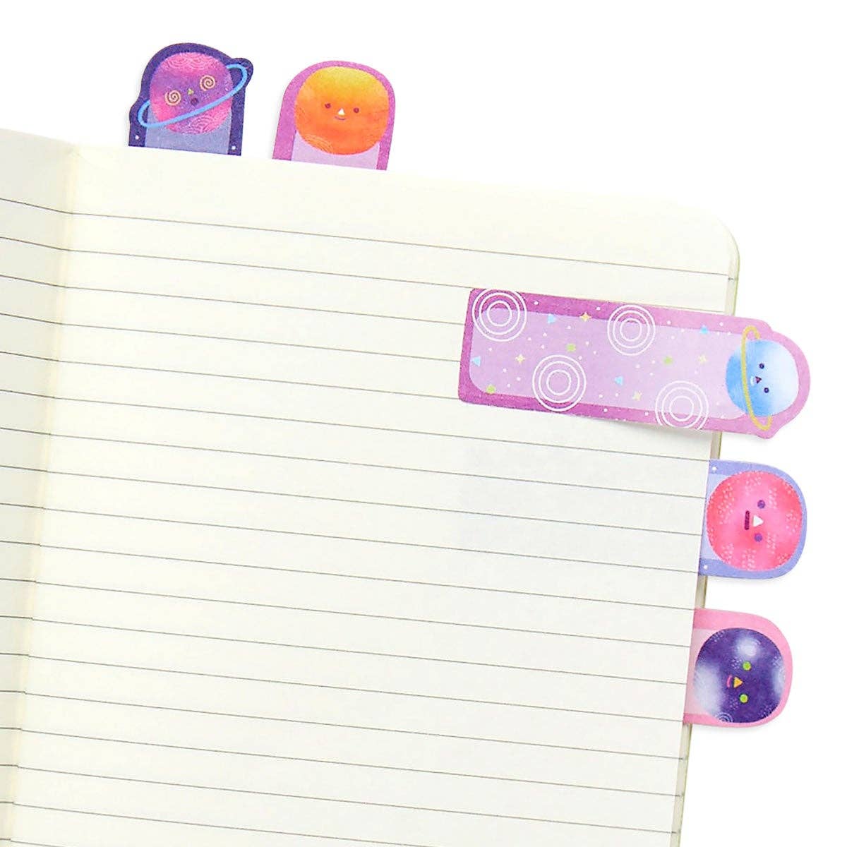 Five OOLY planet pals sticky tabs inside a lined workbook.