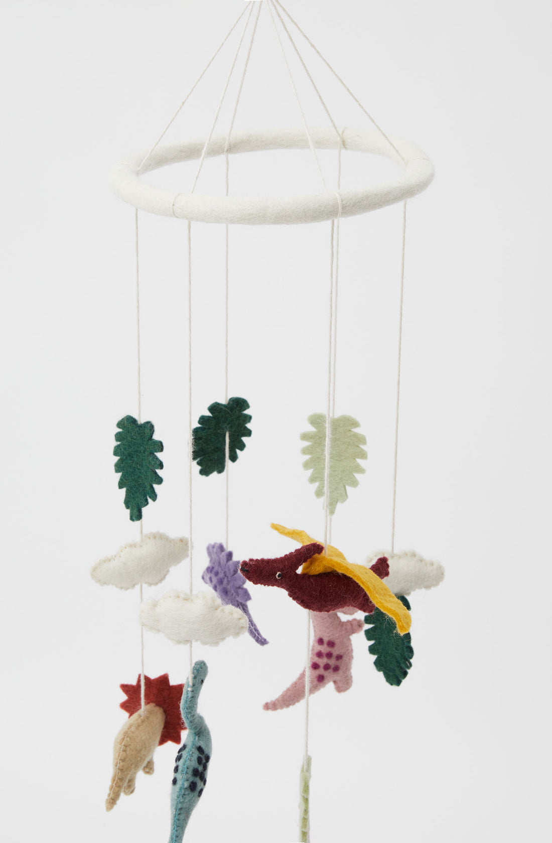 PHILÉ baby mobile with hanging dinosaurs.