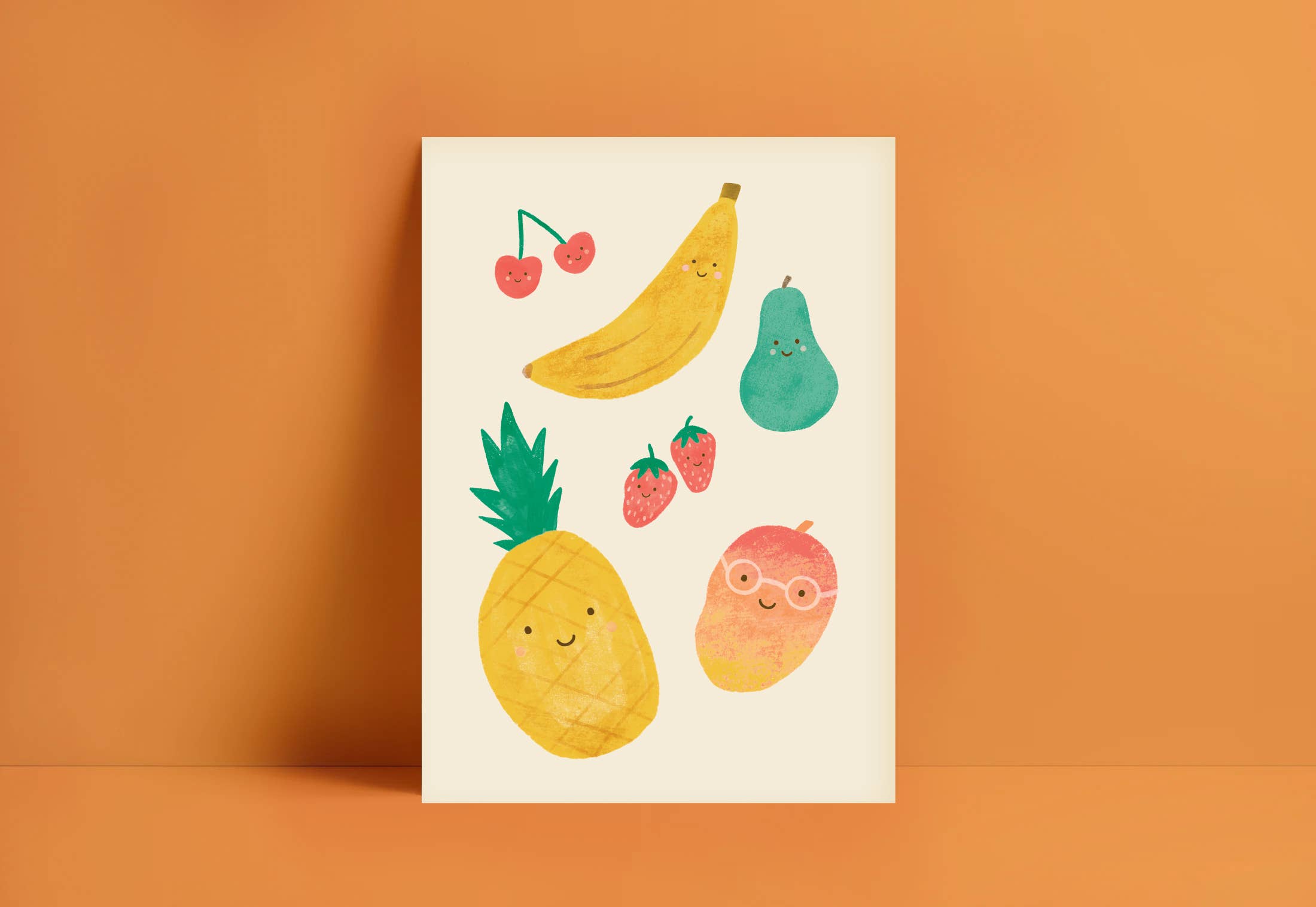 The Cute Fruit Wall Art Print by LAUREN SISSONS STUDIO showcases a framed illustration set against an orange background, featuring adorably smiling fruits including a pineapple, banana, pear, cherries, strawberries, and an orange with glasses. Each fruit is adorned with cute facial expressions, making this delightful print perfect for kid's room decor or nursery artwork.