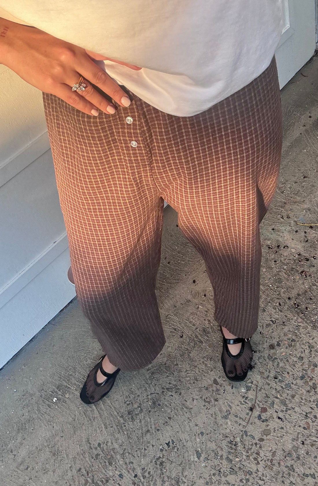 A women wearing the mama cami pant.