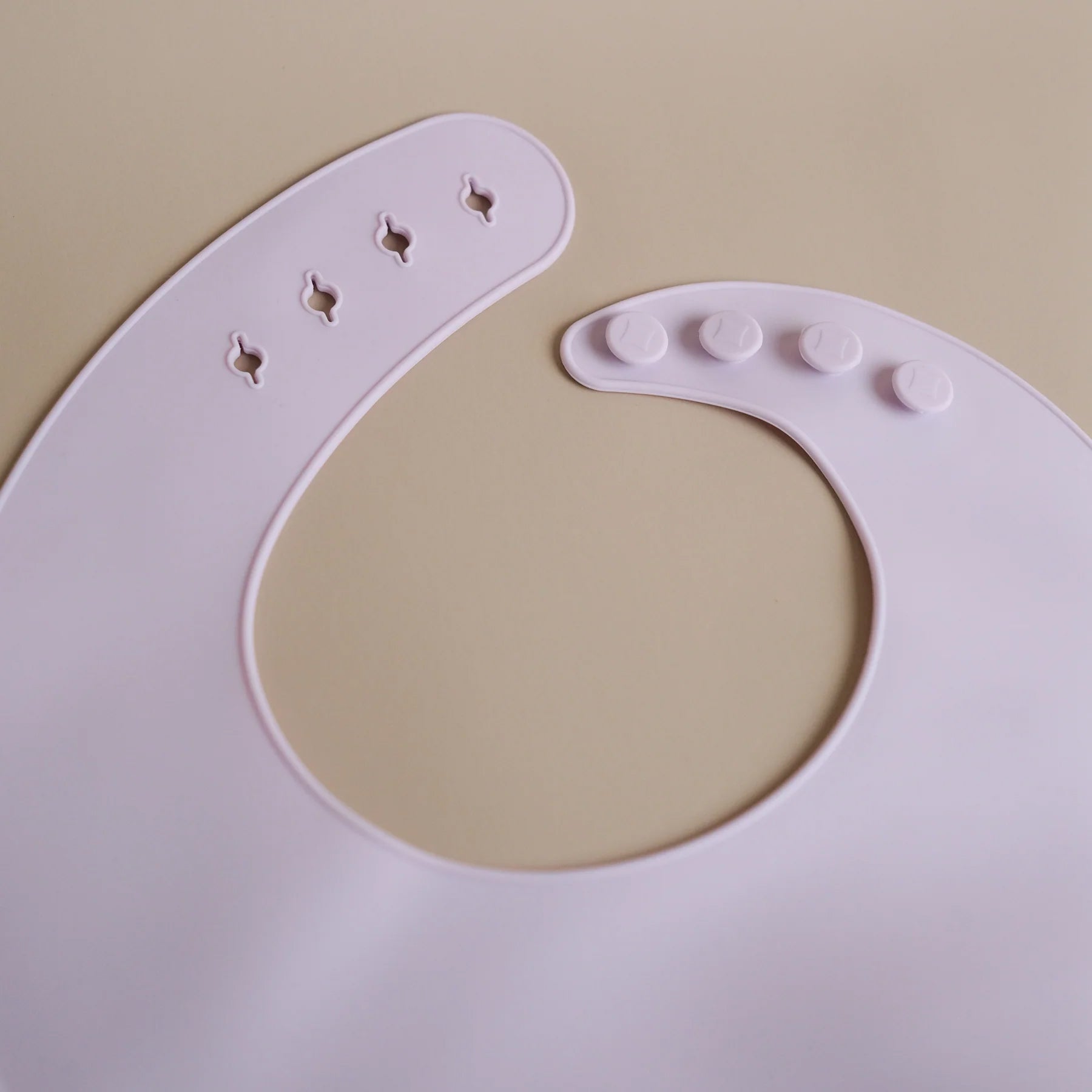 ROMMER Silicone Bib in Lilac close up.