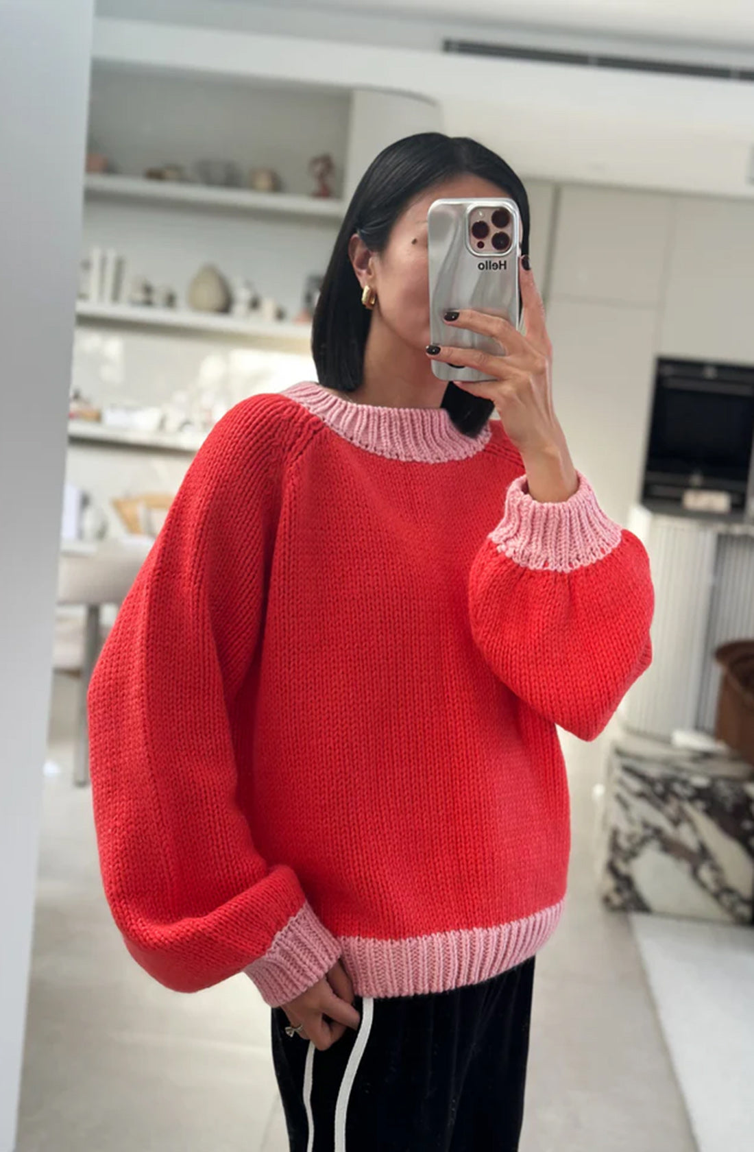 The adult mia contrast knit jumper in red/pink.