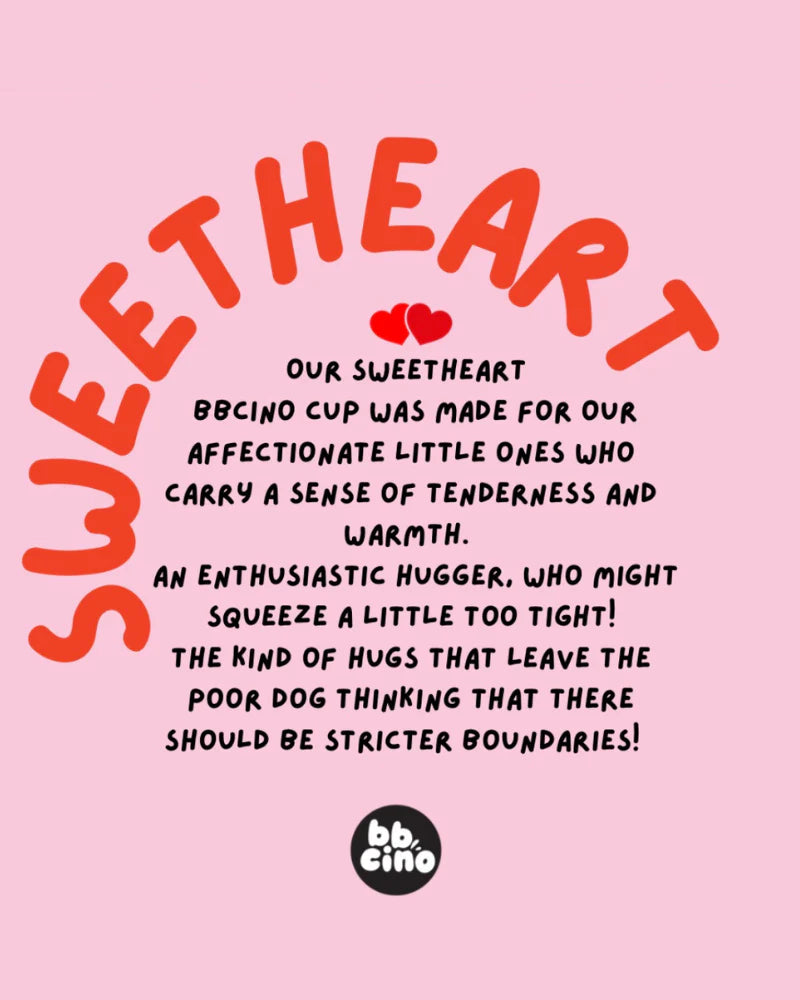 A pink background showcases bold red text with the phrase "SWEETHEART" at the top. Below, black text details the Reusable Babycino Cup 120ml Sweetheart by BBCINO, designed with affection in mind for children. It features a reusable silicone straw ideal for sharing cozy moments. At the bottom, red hearts encircle the "BBCINO" logo.