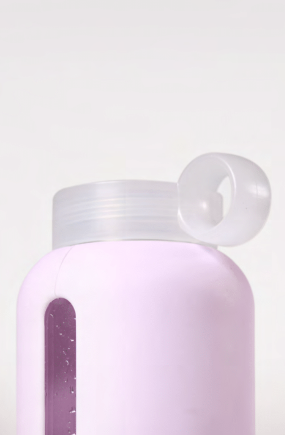 Bink flip cap bottle in purple with a white cap.