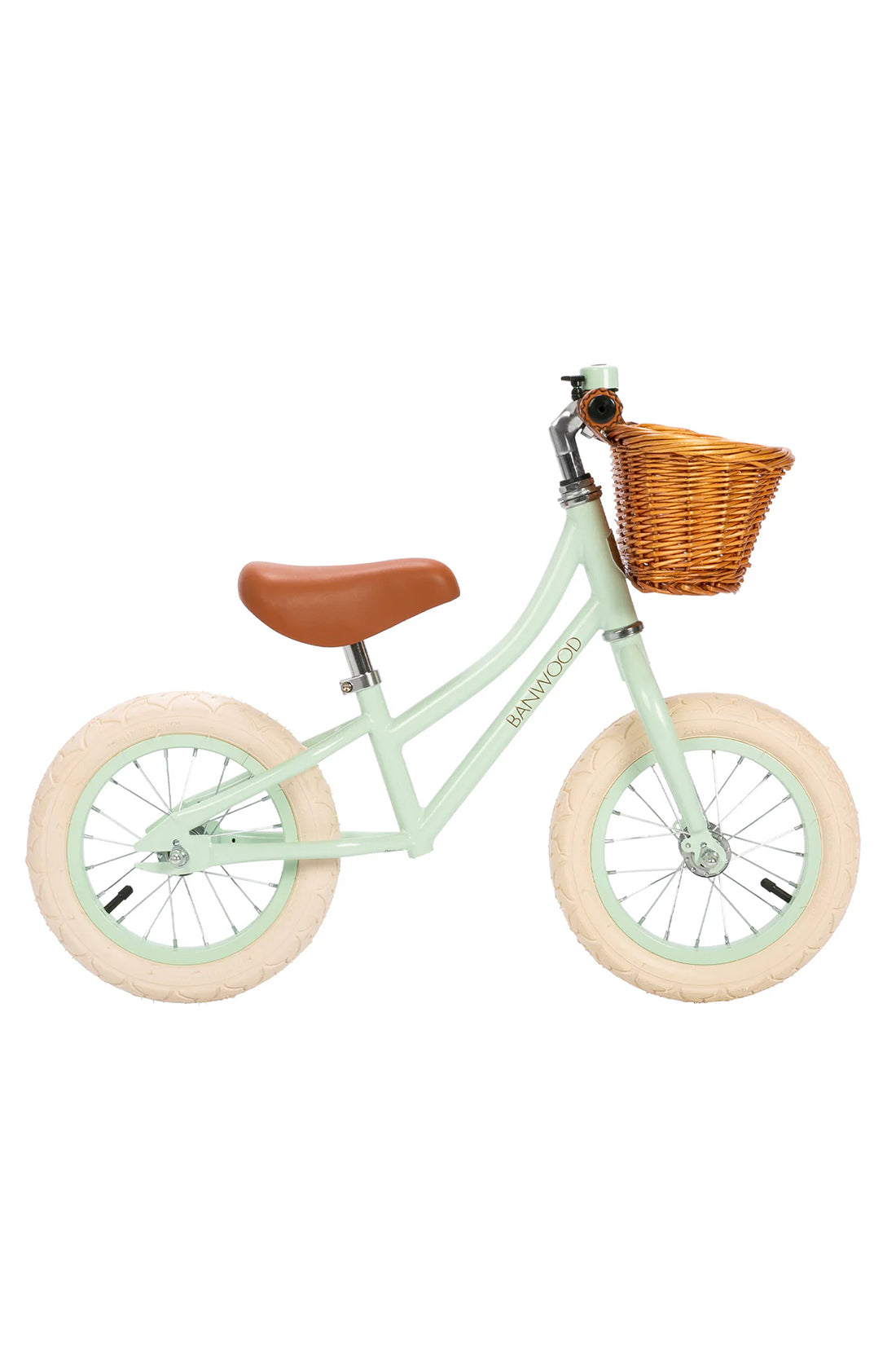 A side on shot of a pale mint banwood vintage balance bike with a straw basket.