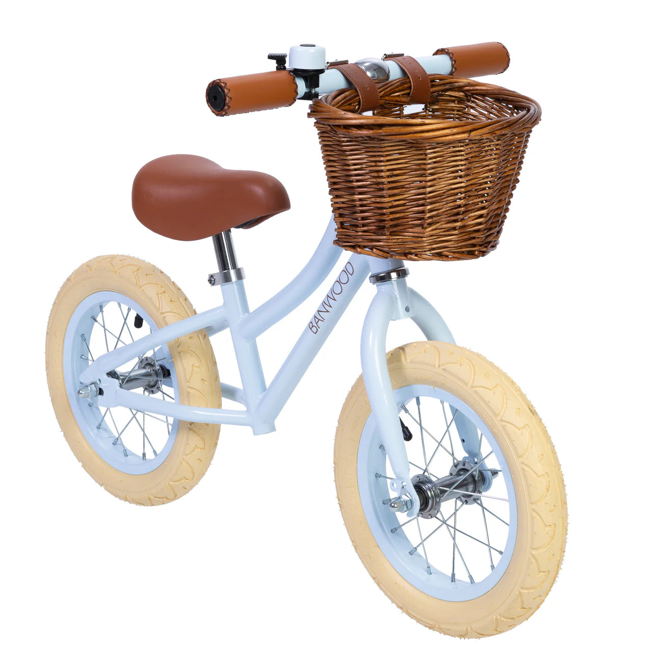 A 45 degree angle shot of a sky blue banwood vintage balance bike with a straw basket.