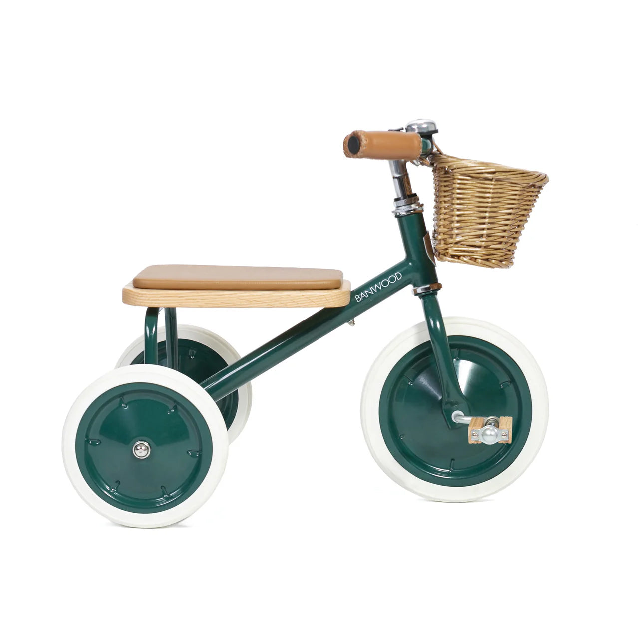 A side on shot of a green banwood trike with a straw basket.