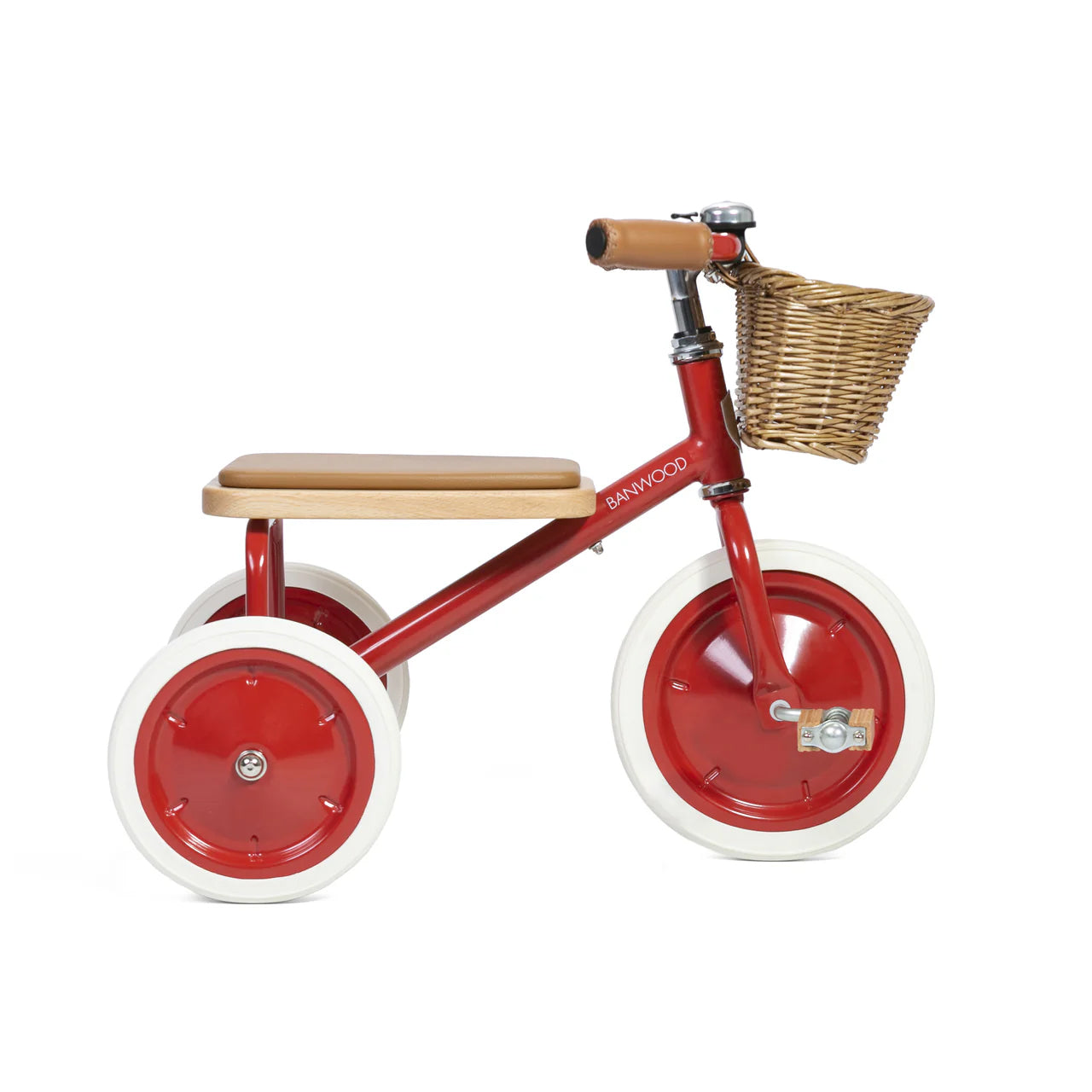 A side on shot of a red banwood trike with a straw basket.