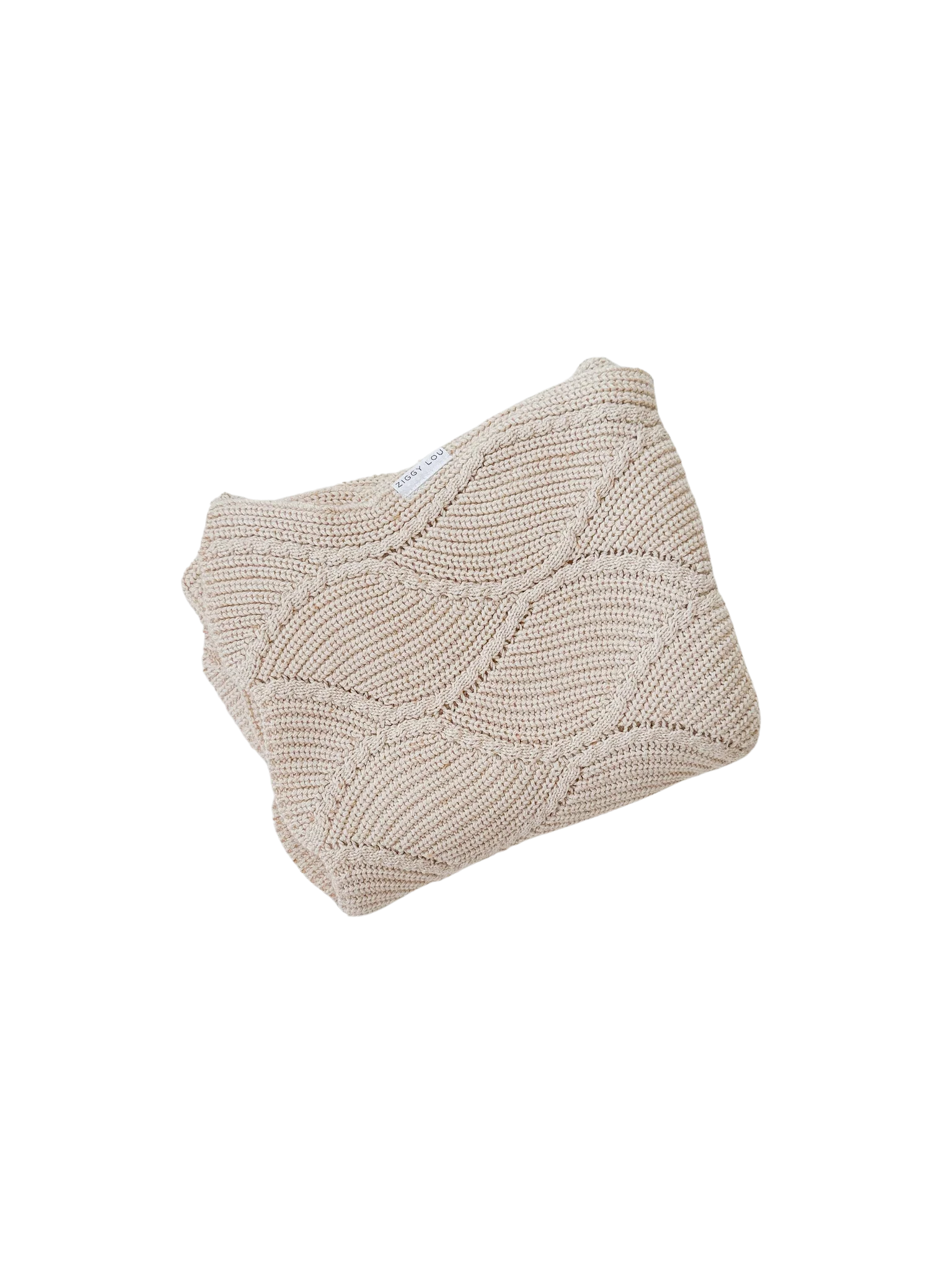 The Ziggy Lou - Blanket Biscotti Fleck by ZIGGY LOU is a folded, light beige 100% cotton knit blanket with a diamond wave pattern, shown on a plain white background.