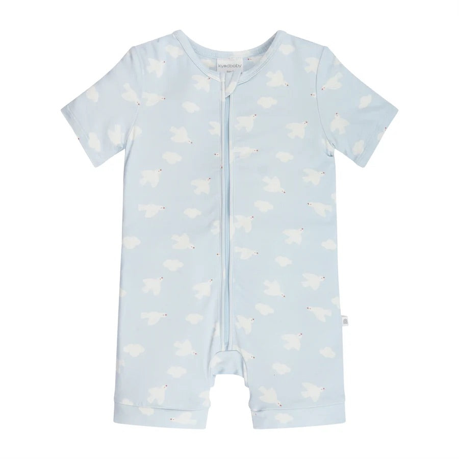 The light blue KYND BABY Day or Night Short Sleeve Onesie Bird Song is crafted from EcoCosy Viscose and features a subtle pattern of white clouds. This sustainable fabric ensures a soft touch on newborn skin, complemented by its short sleeves and convenient front zipper.