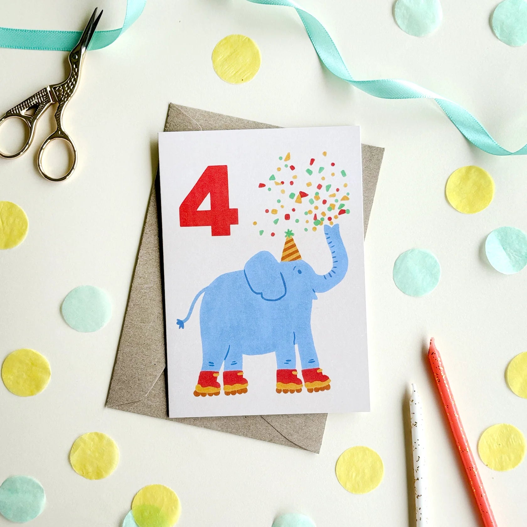 A 4th birthday age milestone card by lauren sissons with an elephant on it wearing rollerskates.