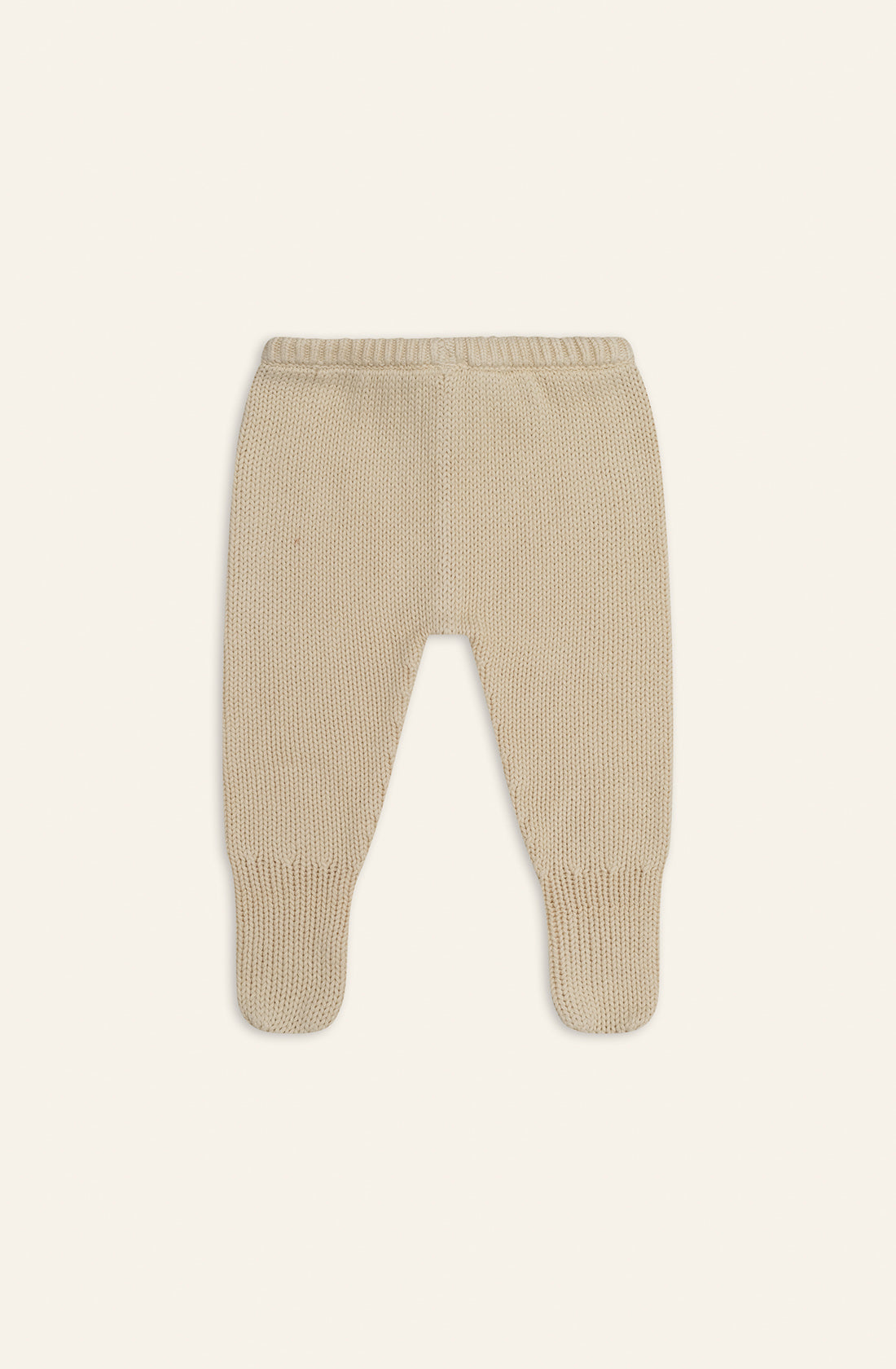 The back of the poet knit pants in biscuit.