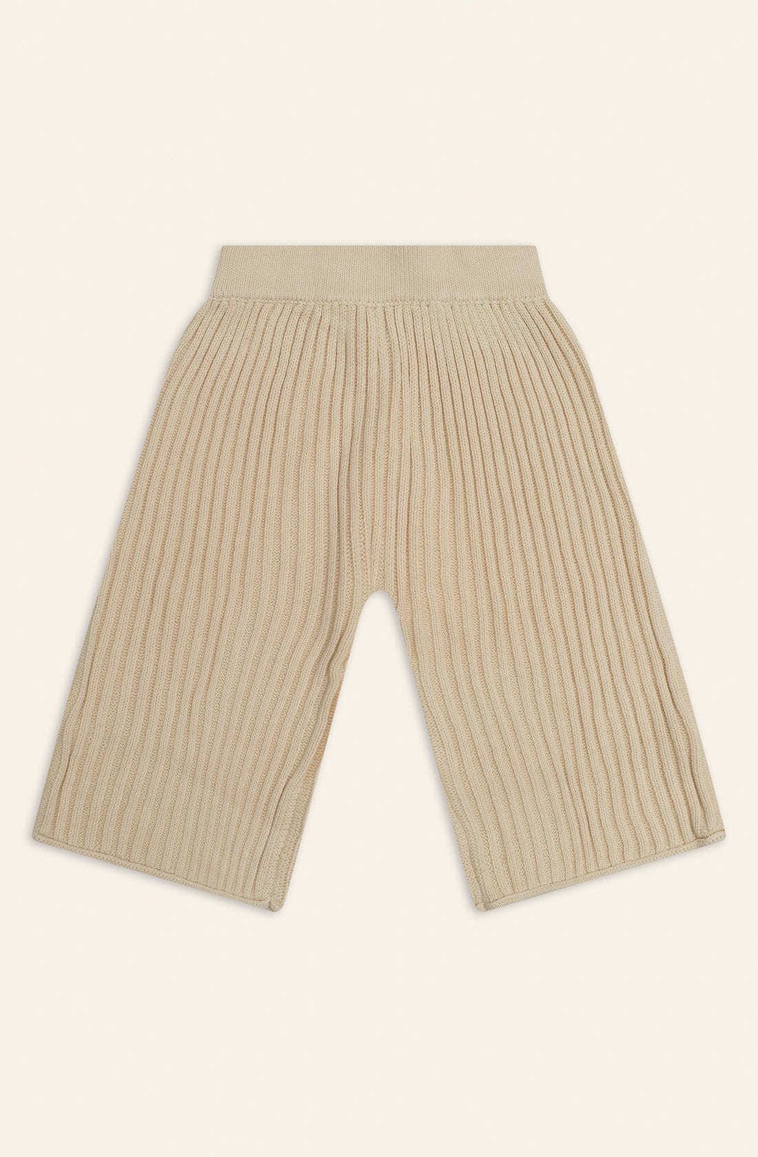 The back of the essential knit pant in biscuit.