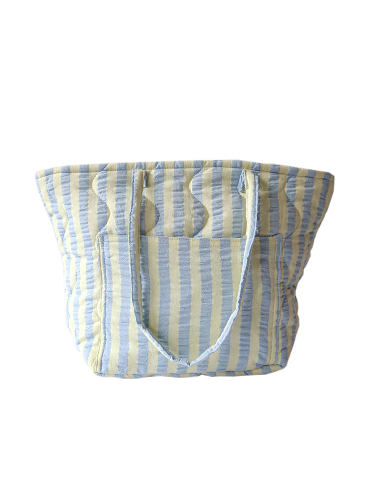 Mosey Me Butter Blue Seersucker Quilted Bag flatlay