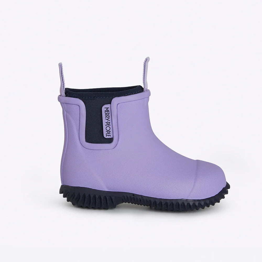 The Merry People Bobbi Kids Gumboot in Lavender and Navy features a light purple design with a black sole, "Merry People" side tag, and front-back pull tabs for easy wear. This vegan, waterproof boot is ideal for young adventurers.