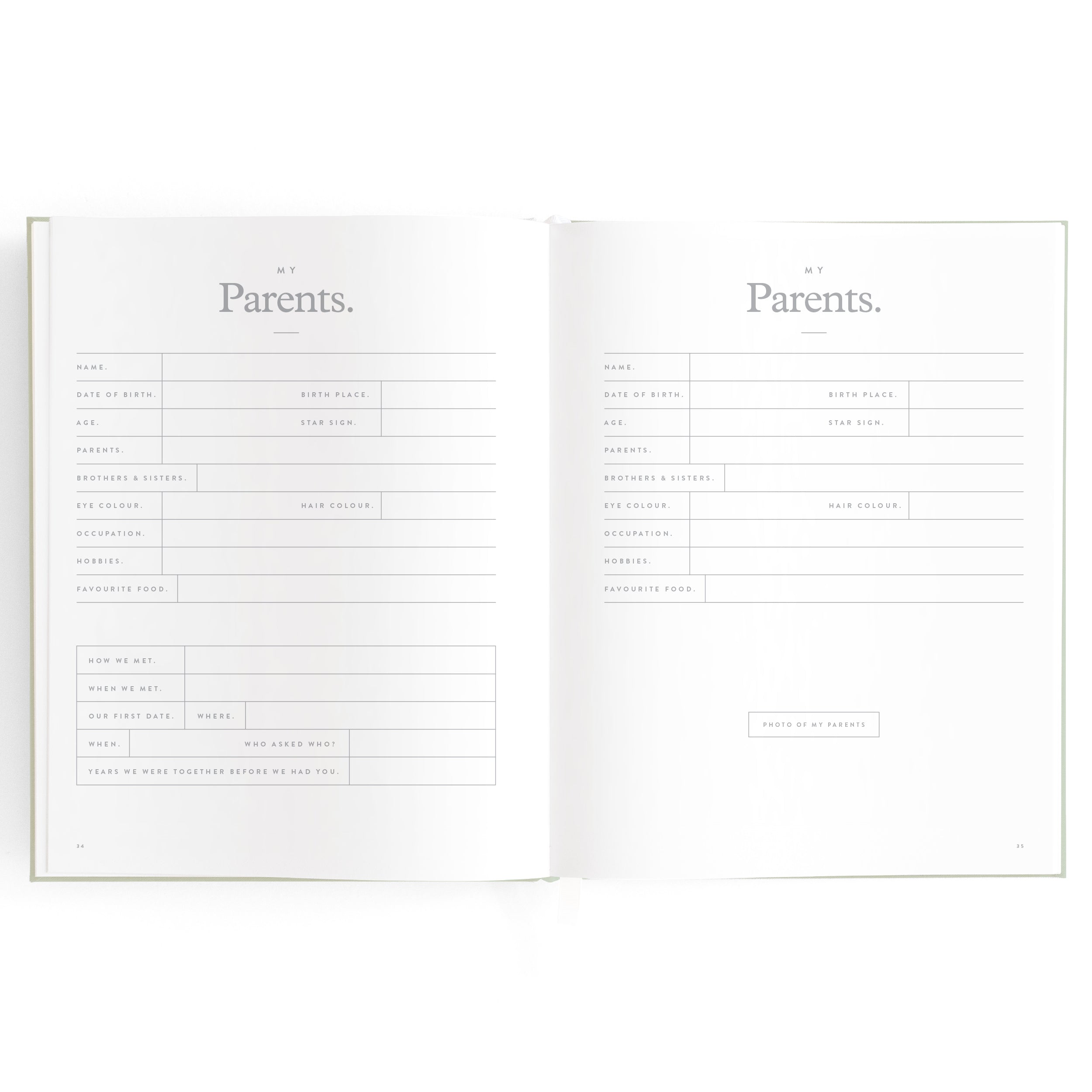 The Baby Book Pistachio by FOX & FALLOW showcases an open book with two pages titled "My Parents." Each page includes sections to fill in information such as name, birth date, birthplace, years alive, profession, and favorite activities, among other details. This family keepsake features a minimalist design.