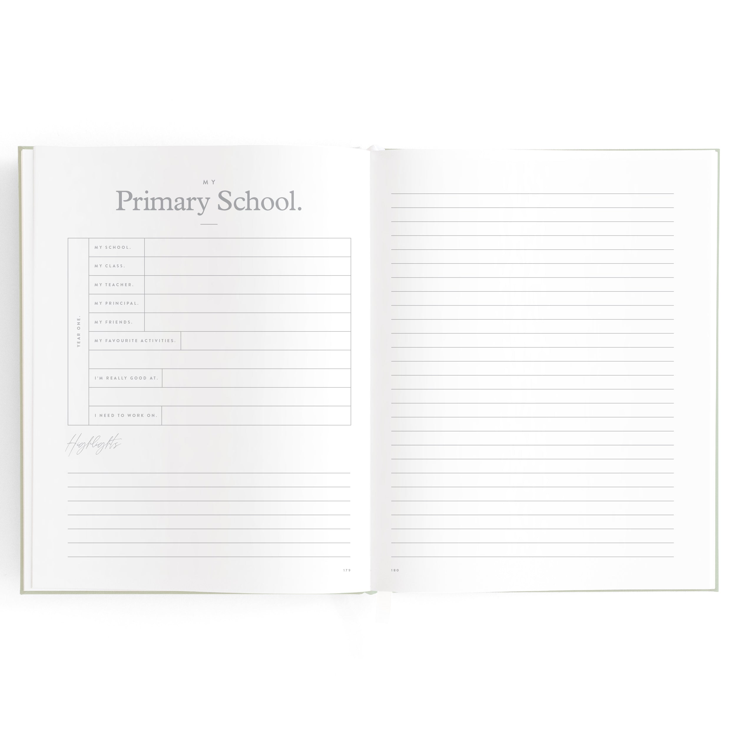 An open Baby Book Pistachio journal titled "My Primary School" by FOX & FALLOW on the left page, featuring sections for noting down the name of the school, start date, end date, teachers, classmates, and memories. This family keepsake has a right page with lined space for additional writing.