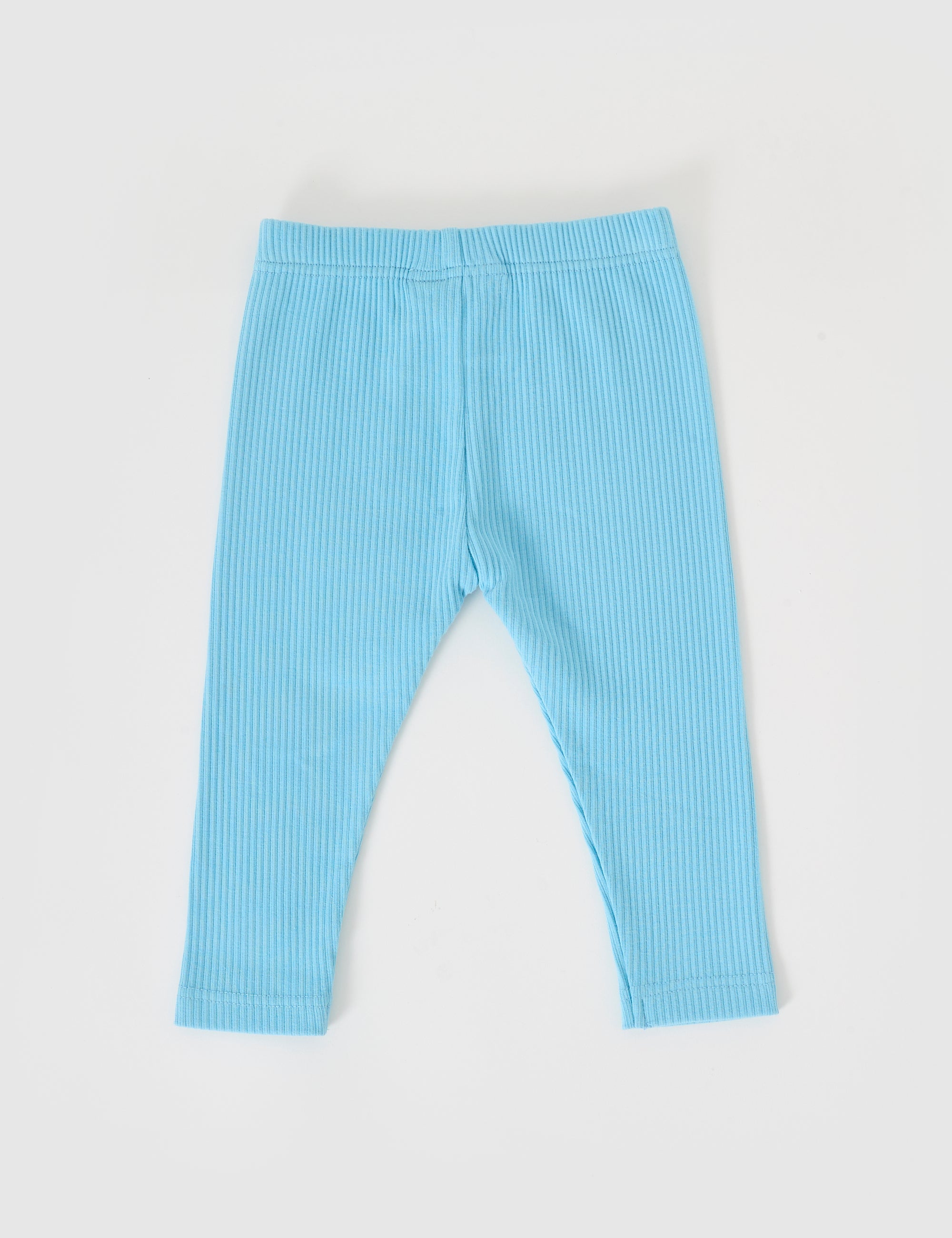 Goldie + Ace's "Bowie Rib Legging Sky Blue" for toddlers, crafted from a soft cotton elastane blend, ensures stretch and comfort with an elasticated waist. Featured on a white background.