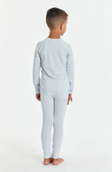 Rear view of boy wearing the sleep set in arctic blue