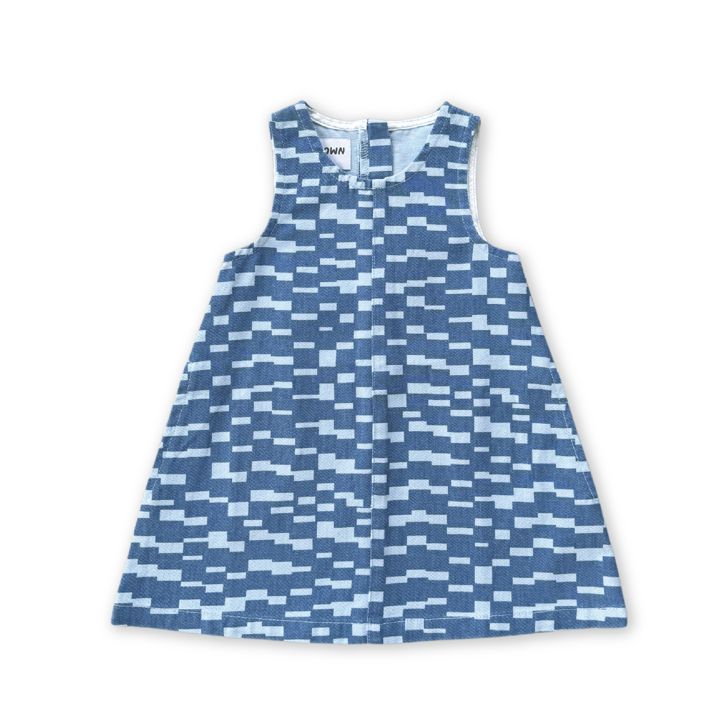 The GROWN Boxes Denim Dress by GROWN is a sleeveless, A-line kids' dress in blue and white geometric block-print organic cotton denim, featuring a back zipper, shown laid flat on a black background.