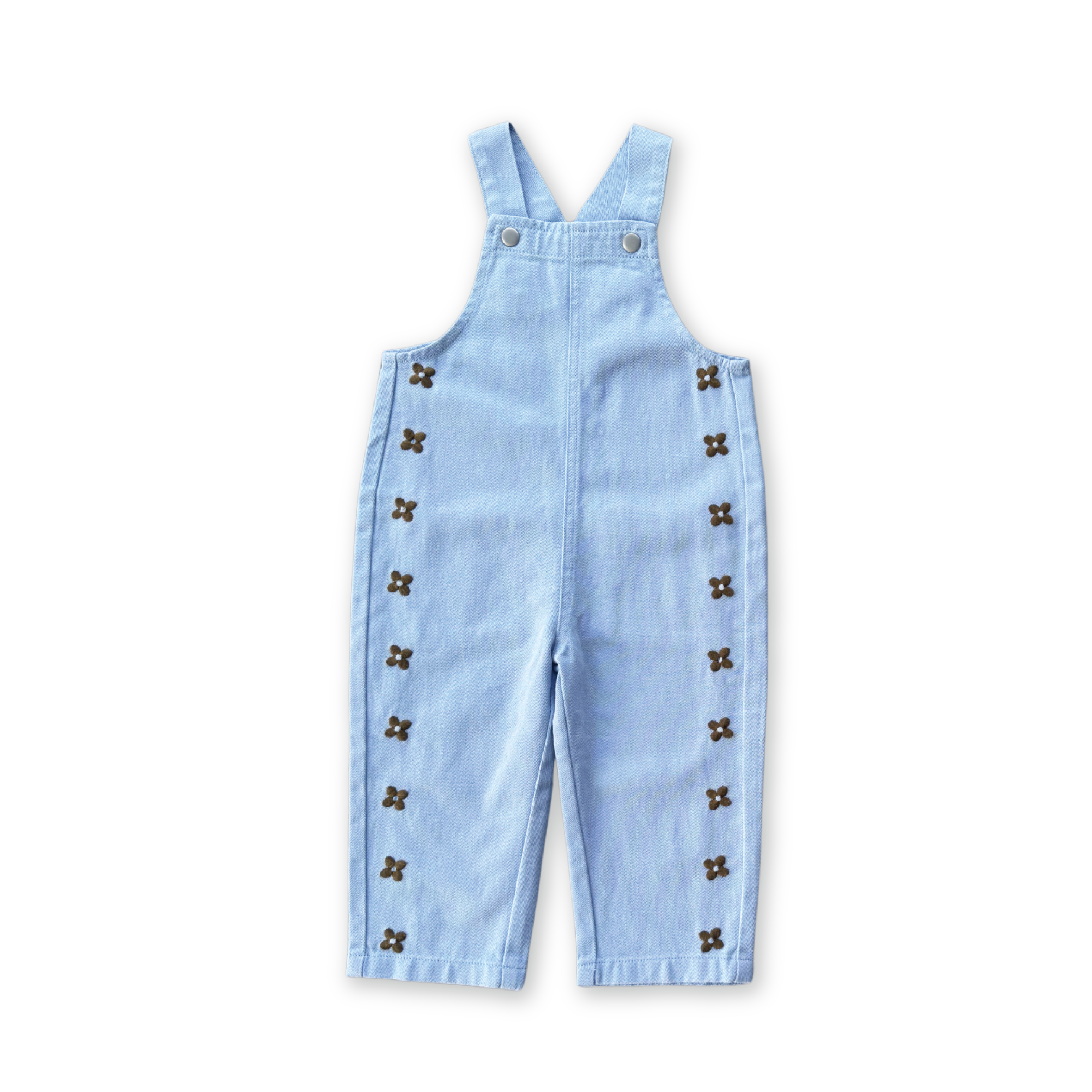 GROWN's Organic Embroidery Posy Overalls in light blue organic cotton denim feature shoulder straps, metal press snaps, and dark decorative side buttons, shown on a black background.