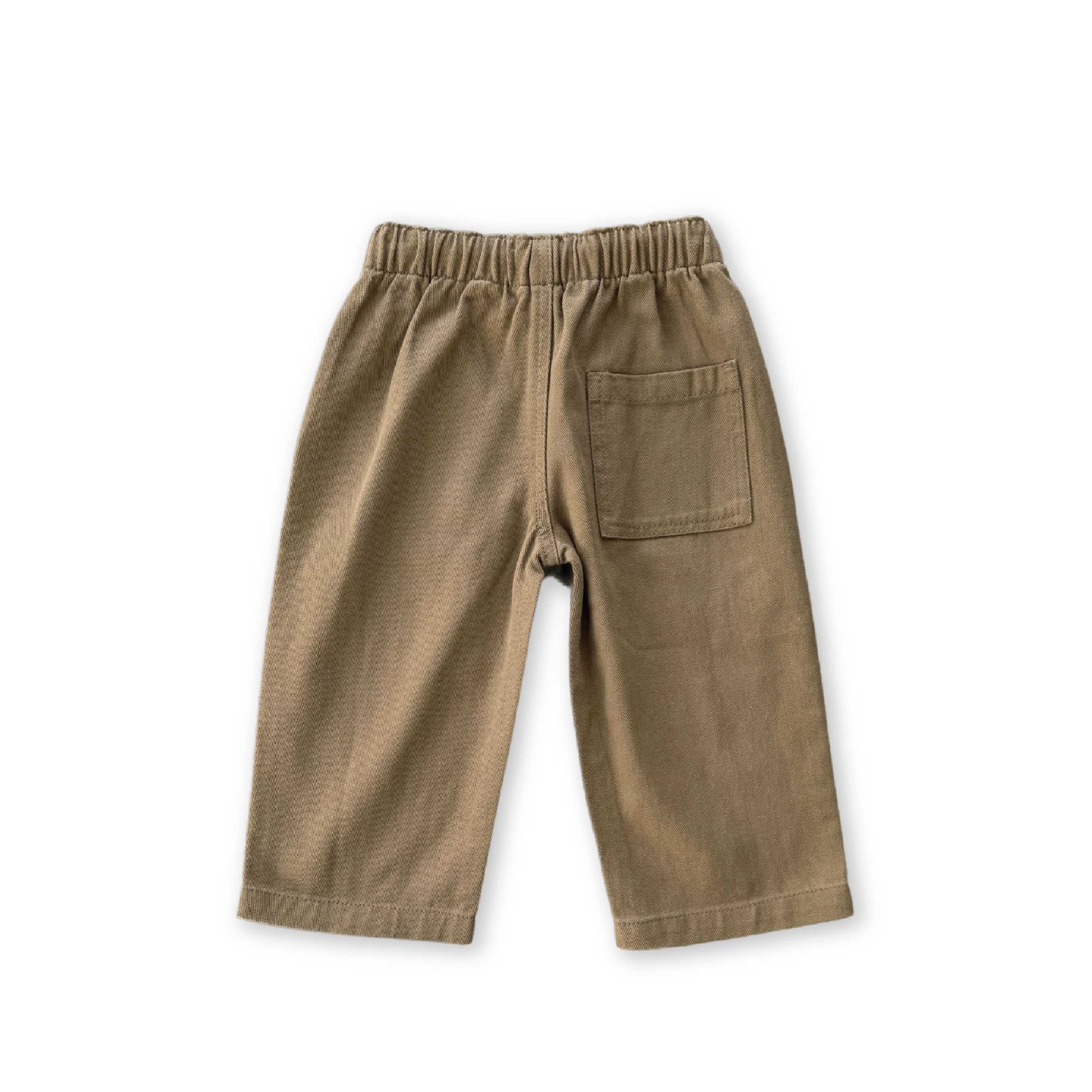 The GROWN Organic Everyday Denim Pant Coffee features a relaxed fit, elastic waistband, and a single back right patch pocket, made from organic cotton for kids. Shown against a black background.