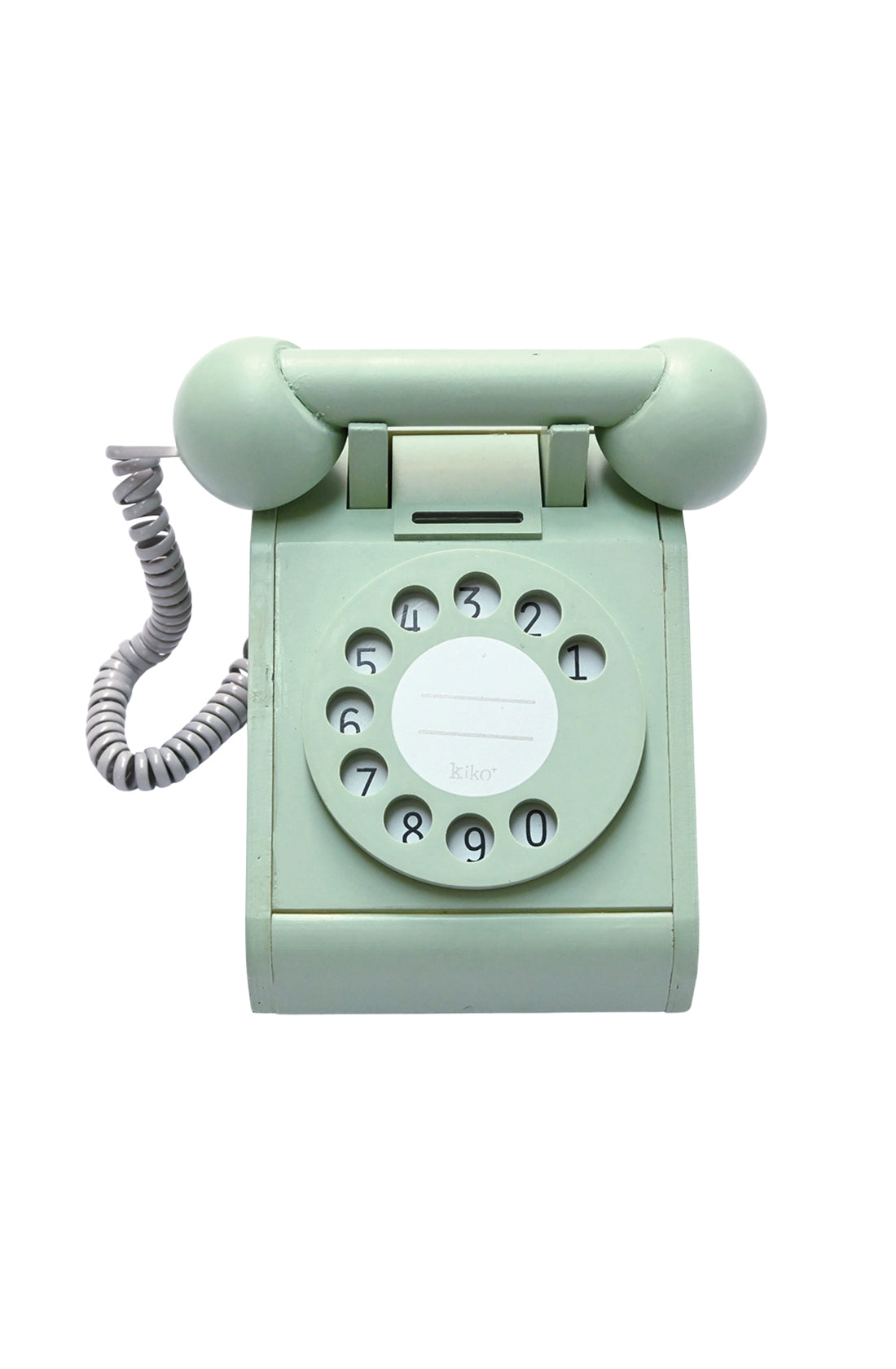 The Retro Telephone Green by KIKO & GG is a vintage pale green rotary dial telephone with a coiled cord, featuring numbers from 1 to 9 and a circular dial. The handset rests on top of the phone, showcasing its retro form, making it perfect for sparking children's imagination with its charming, nostalgic design.