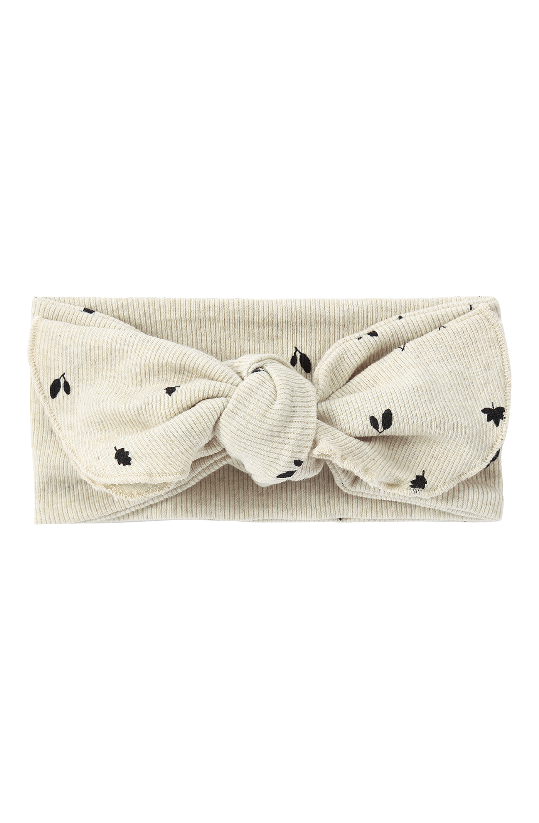 The Elastic Headband Fall Leaves from SUSUKOSHI is a beige headband with a prominent knot in the center, made from organic cotton. It boasts a subtle ribbed texture and is embellished with small black leaf and bee print patterns scattered across the fabric, ensuring both comfort and style.