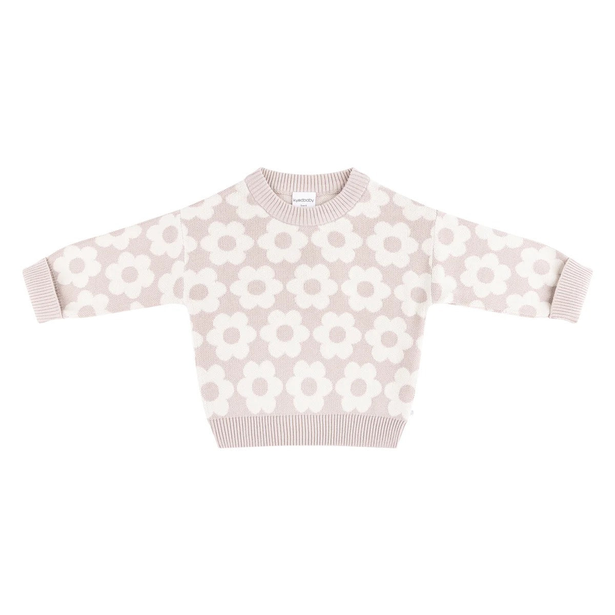 The KYND BABY Kynd Baby - Knit Jumper Neutral Flower is a beige, long-sleeve organic cotton jumper with large white flower patterns and ribbed cuffs, hem, and neckline.