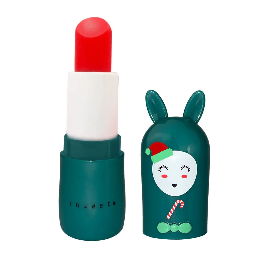 This vegan-friendly Christmas Lip Balm Cherry by INUWET comes in an eco-conscious green case, housing a vivid red lip product. The cap is adorned with an adorable illustration of a rabbit wearing a Santa hat, embellished with festive details such as a bow and candy cane, making it the perfect addition to your holiday beauty collection.