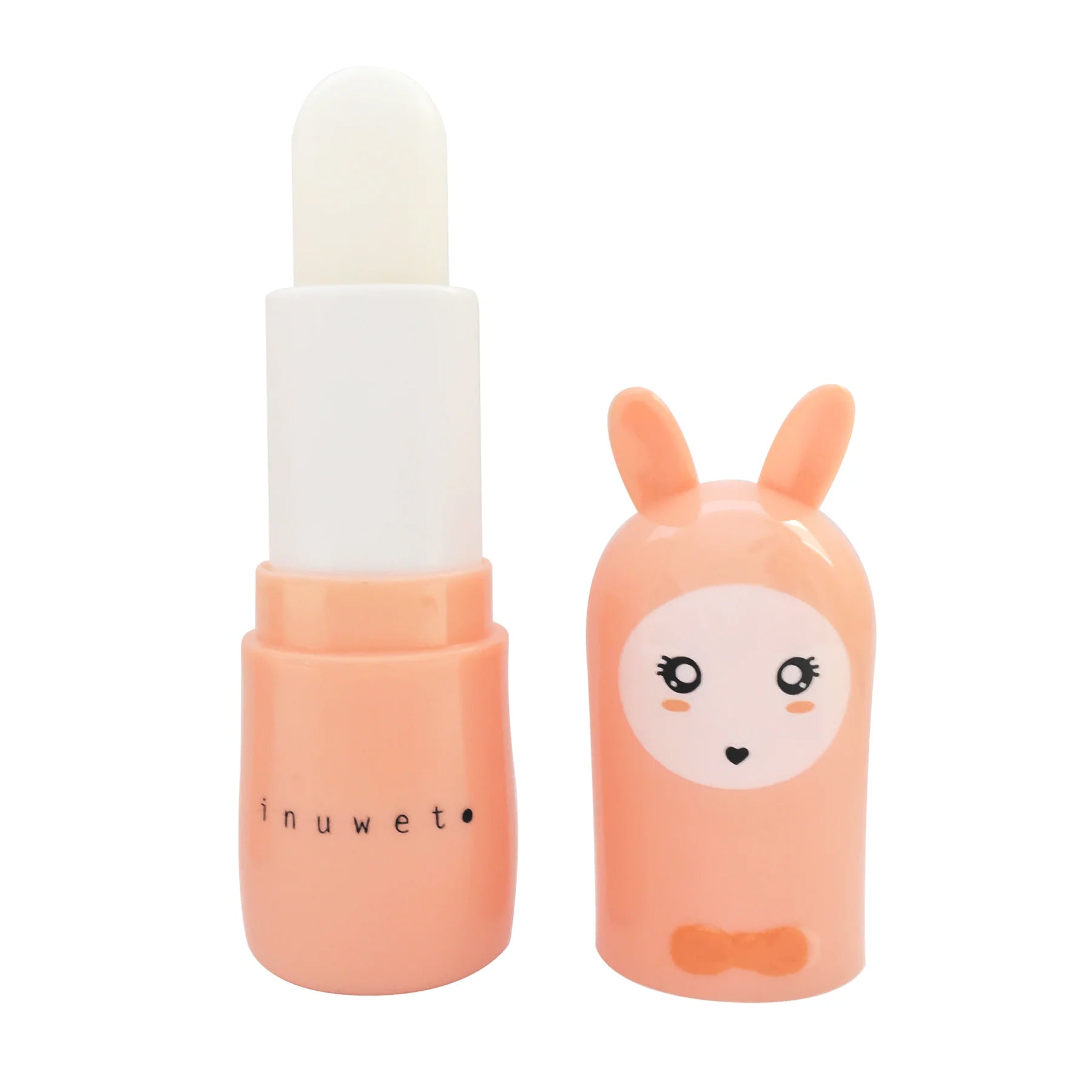 Introducing the adorable Bunny Lip Balm Vanilla/Coco by INUWET. This charming, peach-colored lip balm features a white stick and a cap designed with an irresistible bunny complete with ears, eyes, and a bow tie. Infused with nourishing shea butter, this vegan and cruelty-free product is perfect for keeping your lips soft and hydrated. The brand name "INUWET" is elegantly printed on the side of the container.